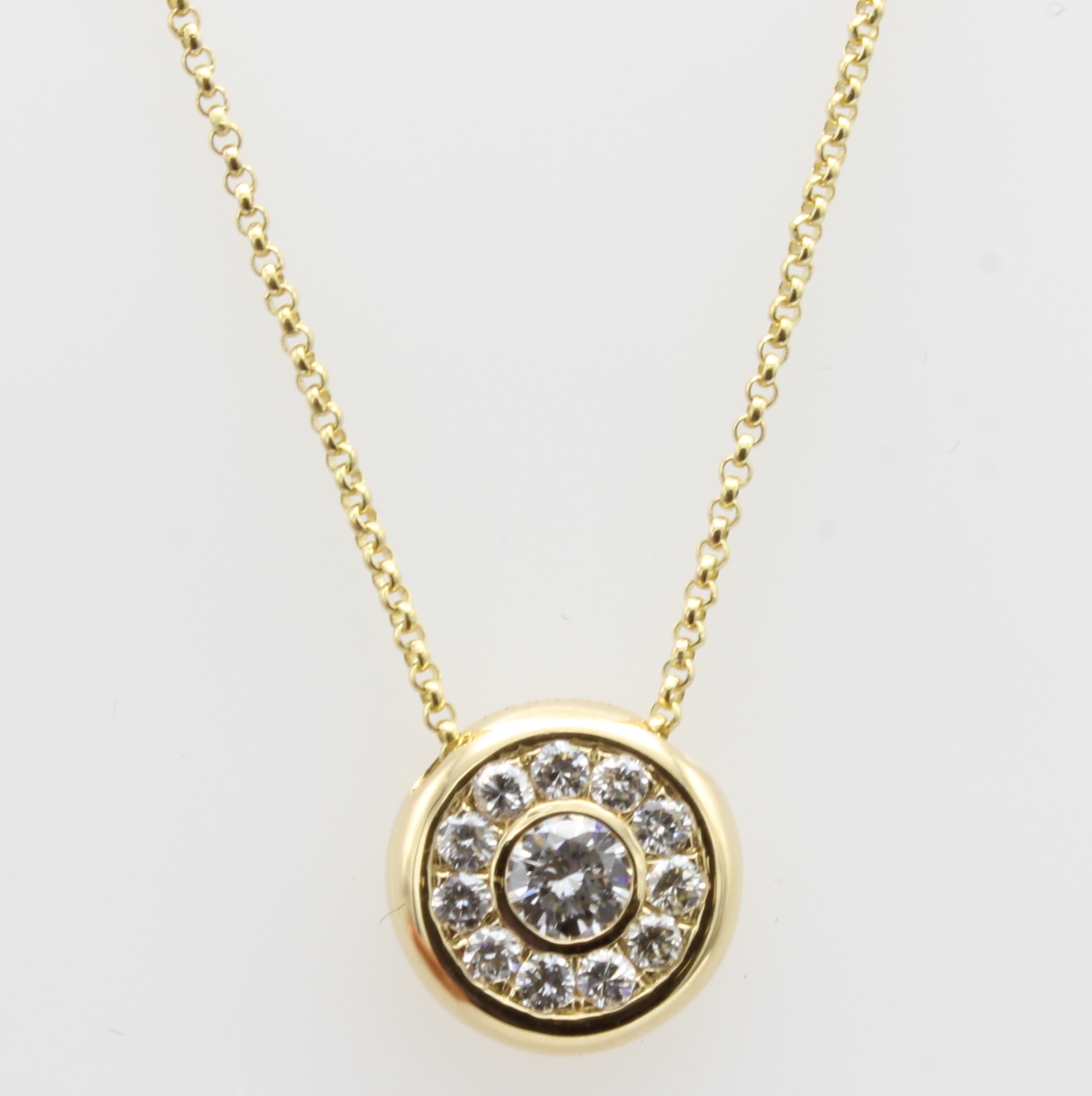 Image 27052659 - Anhänger mit Brillanten an Kette, GG 750/000, Mittelstein ca. 0.17 ct u. 11 ...