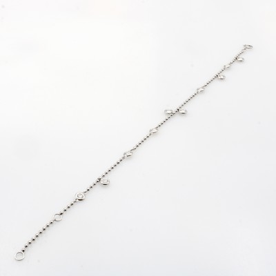 Image Armband mit Brillanten, WG 750/000, 10 Brill. z.T. in Kette integriert zus. ca. 0.67 ct ...