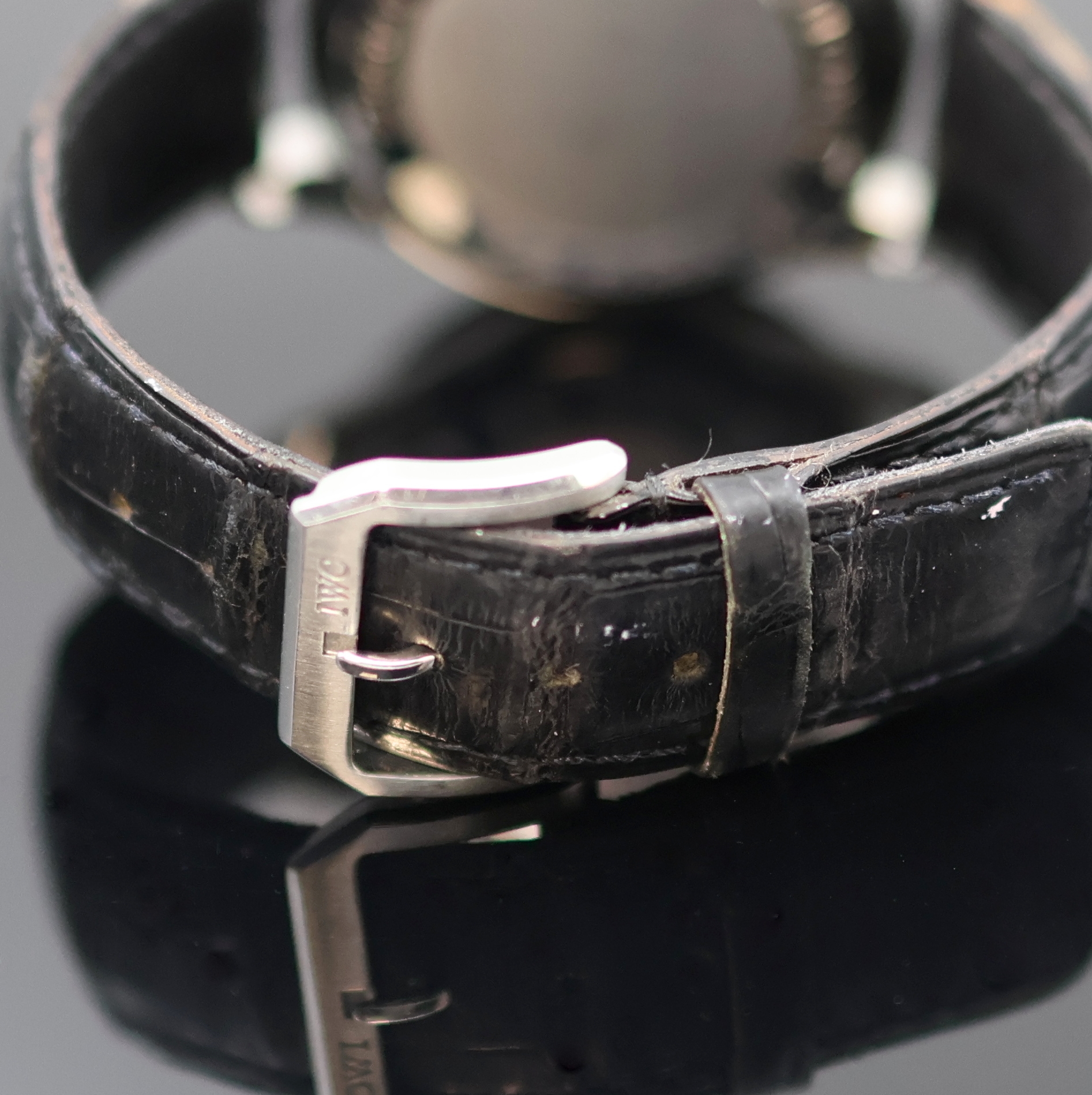 Detail e: IWC Portugieser Armbandchronograph Referenz 3714, Automatik, Edelstahlgeh. inkl. orig. Lederband m. orig. Dornschl., Boden 4-fach verschr., silb. ...