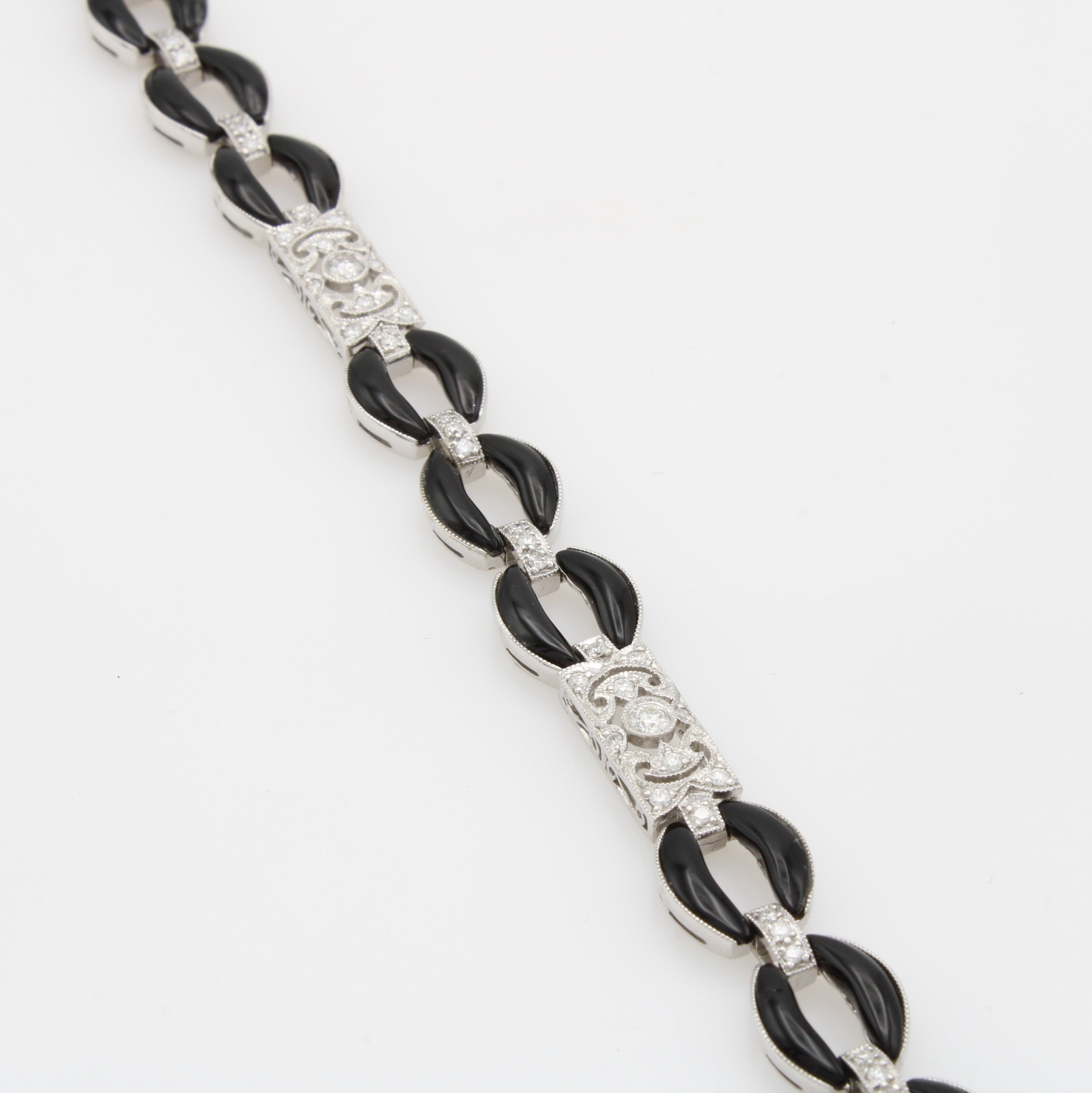 Image 27053094 - Armband im Art Deco Stil mit Onyxen und Diamanten, WG 750/000, Diam. zus. ca. 1.20 ct ...
