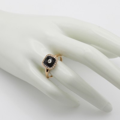 27053084c - Ring mit Topas und Diamanten, RG 750/000, carréef. Ringkopf, facett. Topas (beh.), ...