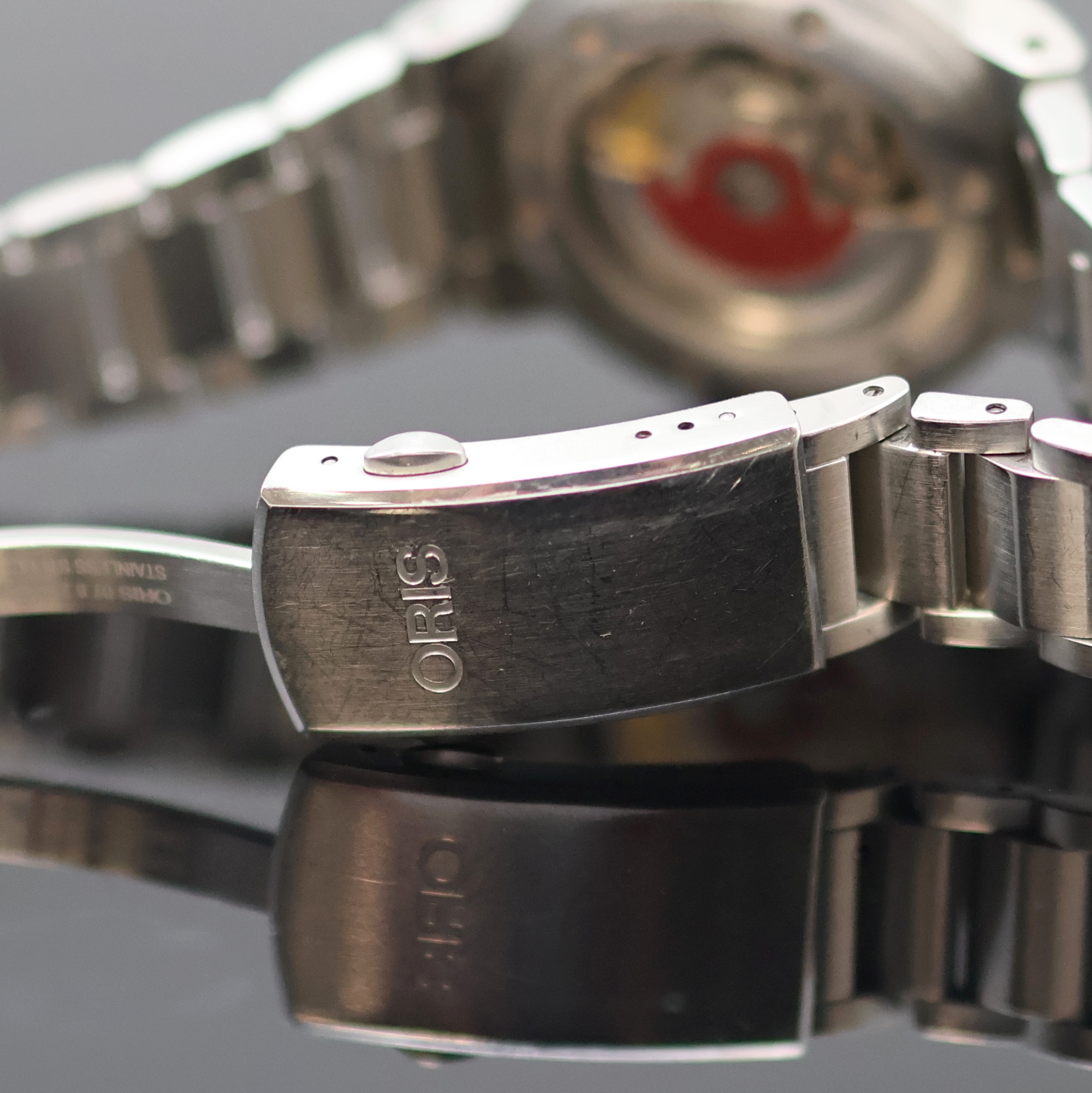 Detail d: ORIS Herrenarmbanduhr Aquis Referenz 7732, Automatik, Schweiz um 2015, beids. vergl. Edelstahlgeh. inkl. Gliederband m. Faltschl. und ...