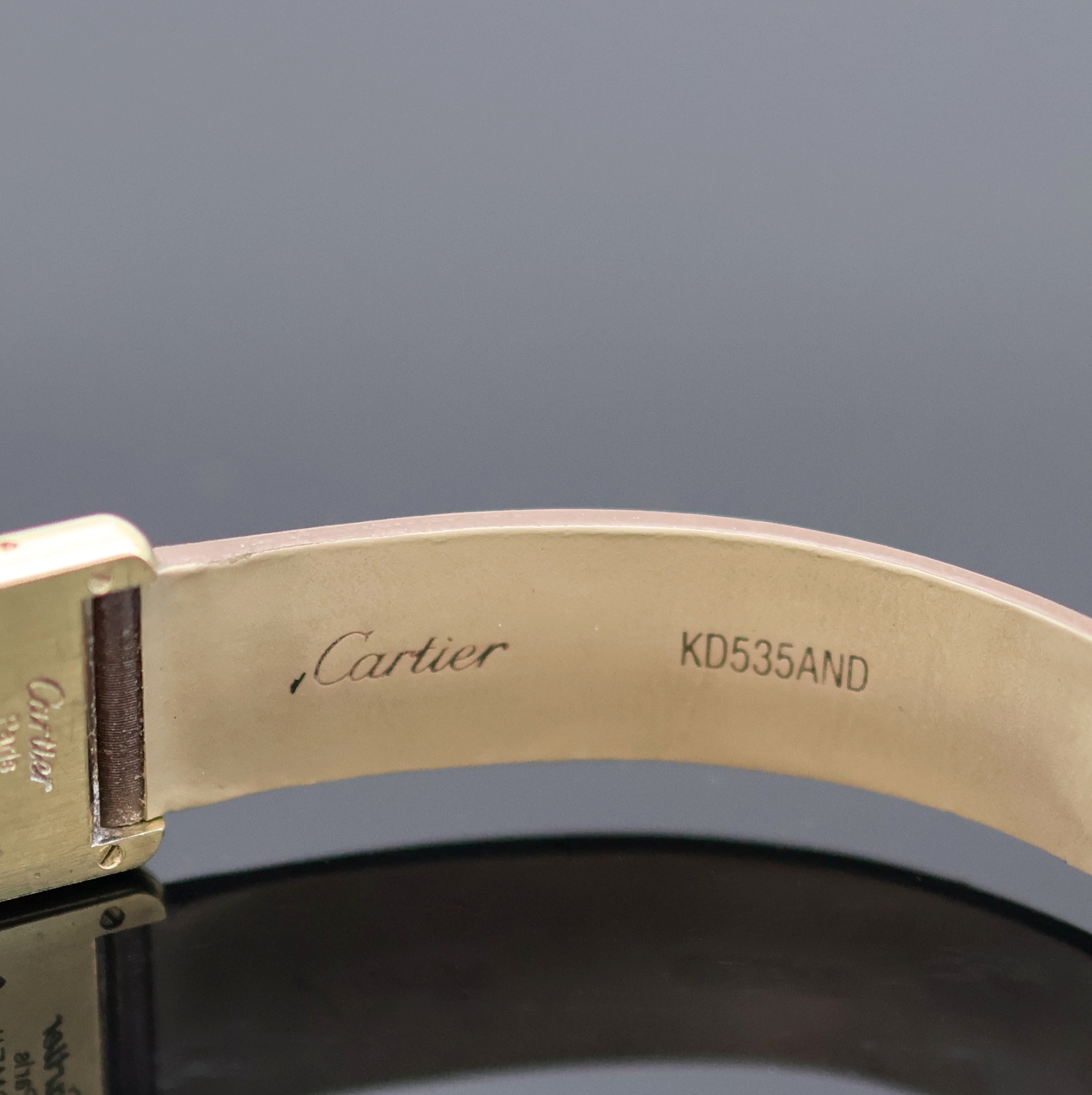 Detail c: CARTIER Paris Damenarmbanduhr Tank Vermeil Referenz 5057001, Schweiz 1990er Jahre, verg. Silbergeh. altersbed. ber., orig. Lederband m. orig. ...
