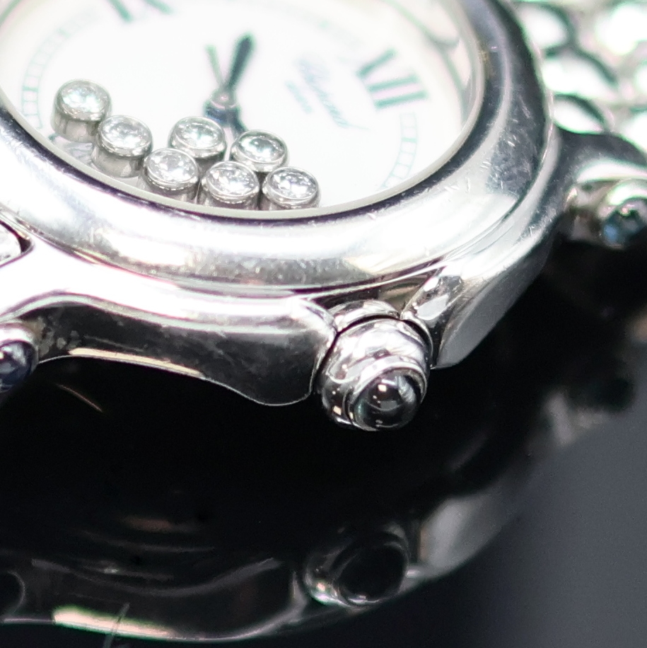 Detail d: CHOPARD Happy Sport Armbanduhr Referenz 27/8236-23, Schweiz um 2000, quarz, Edelstahlgeh. inkl. orig. Gliederband m. dopp. Faltschl., Krone sowie ...