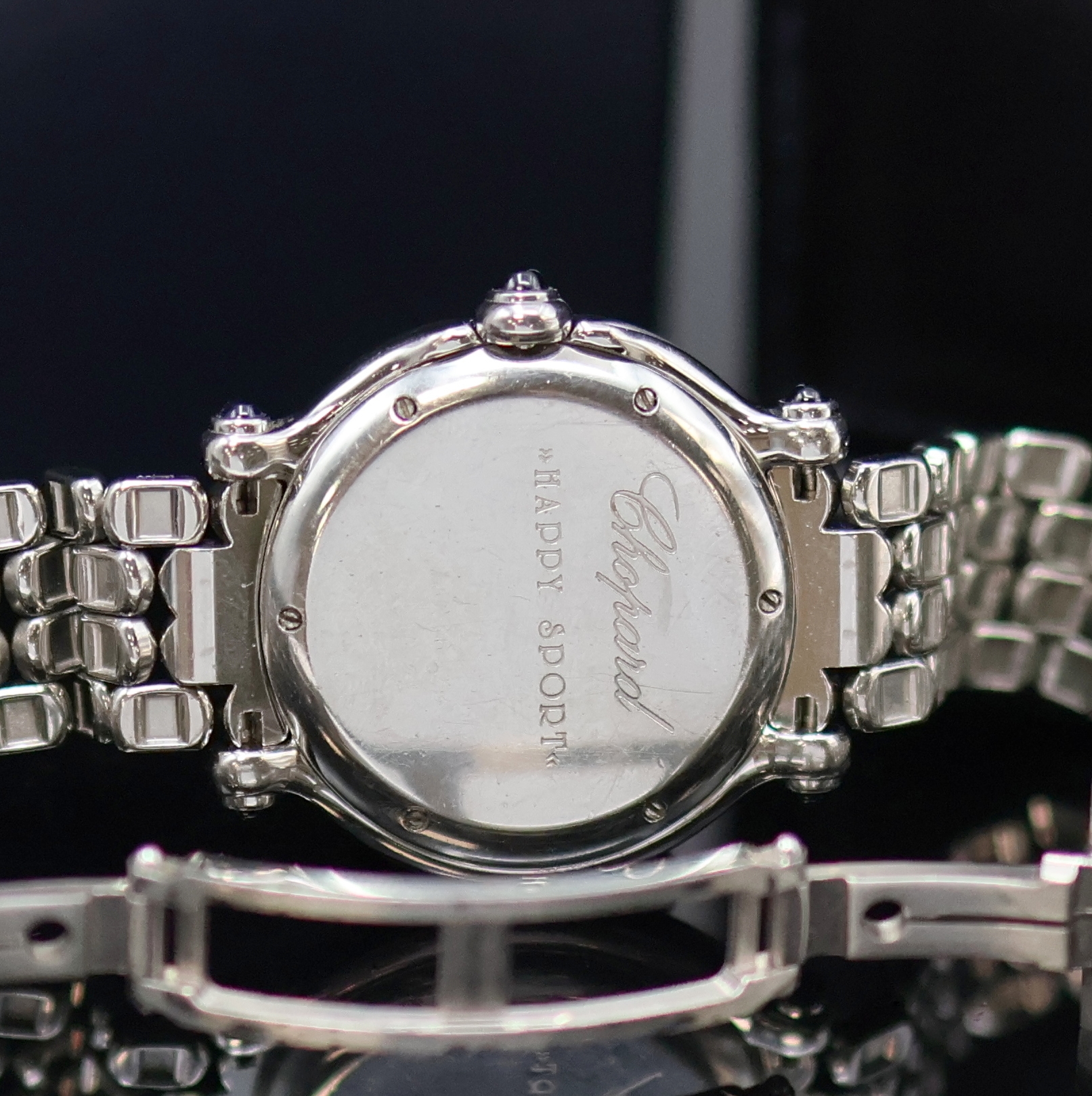 Detail e: CHOPARD Happy Sport Armbanduhr Referenz 27/8236-23, Schweiz um 2000, quarz, Edelstahlgeh. inkl. orig. Gliederband m. dopp. Faltschl., Krone sowie ...