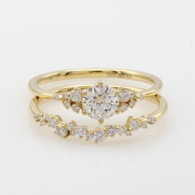 27054219a - Ringset mit Brillanten, GG 750/000, Mittel- stein ca. 0.50-0.52 ct feines Weiß/si, ...