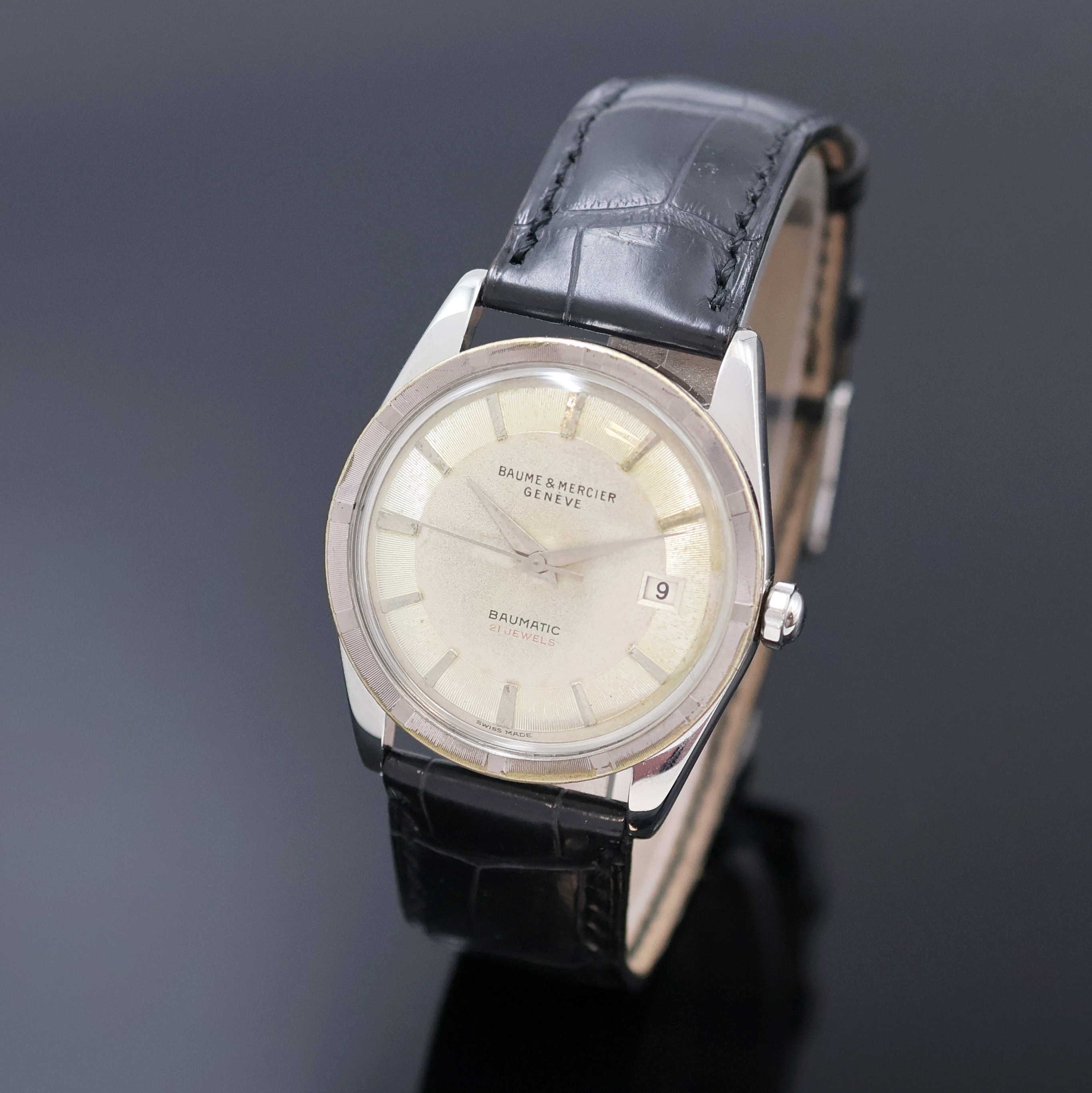 BAUME & MERCIER Baumatic Armbanduhr in Stahl Referenz 1162, Schweiz 1950er Jahre, Automatik, Boden verschr., silb. Zifferbl. pat./fleck., silb. ...
