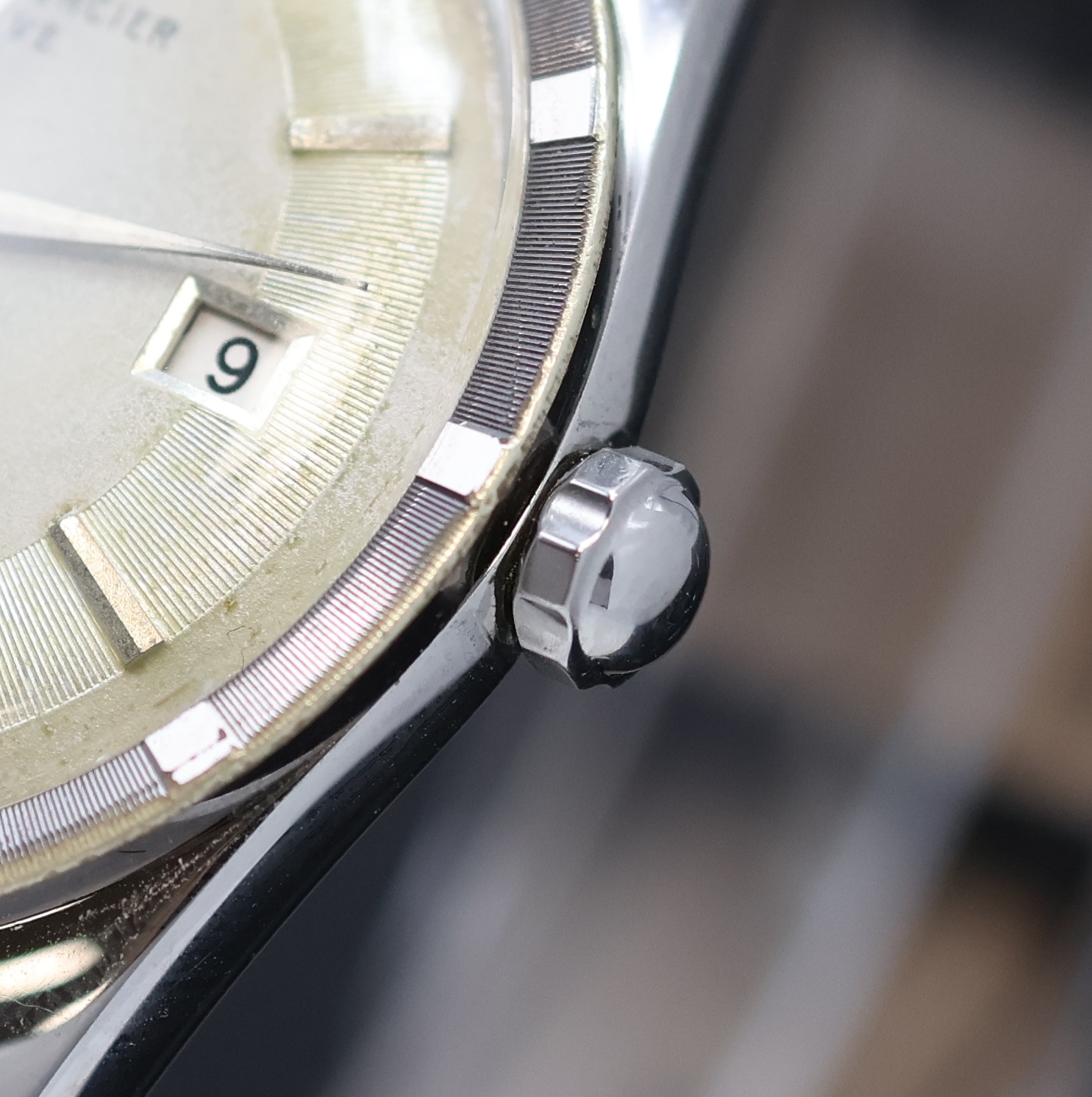 Detail c: BAUME & MERCIER Baumatic Armbanduhr in Stahl Referenz 1162, Schweiz 1950er Jahre, Automatik, Boden verschr., silb. Zifferbl. pat./fleck., silb. ...