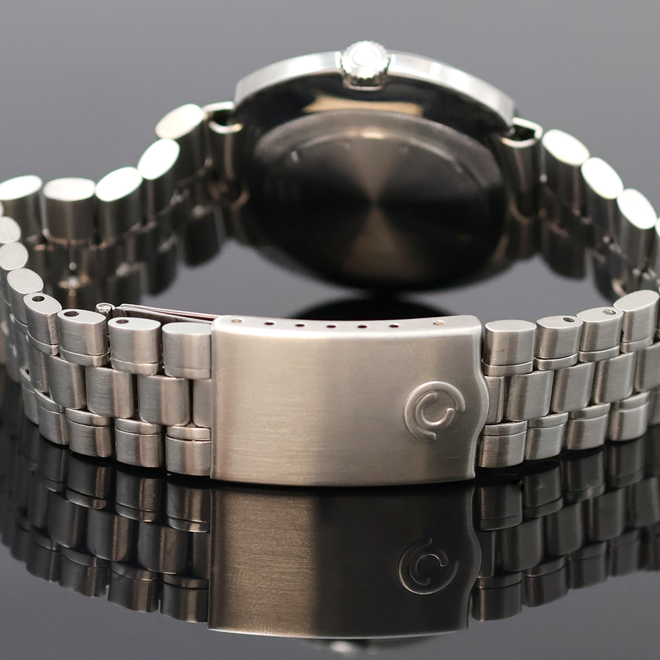 Detail d: CERTINA Revelation Herrenarmbanduhr Referenz 5801 185, Schweiz um 1970, Automatik, Einschalengeh. in Edelstahl, orig. Krone, orig. Certina Stahlband ...
