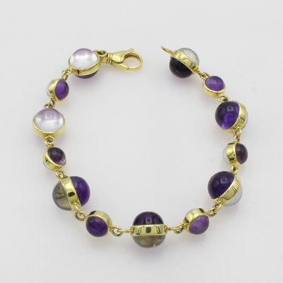27054790a - Armband mit Amethysten und Aquamarinen, GG 585/000, Farbsteincabochons zus. ca. 79.4 ct, ...