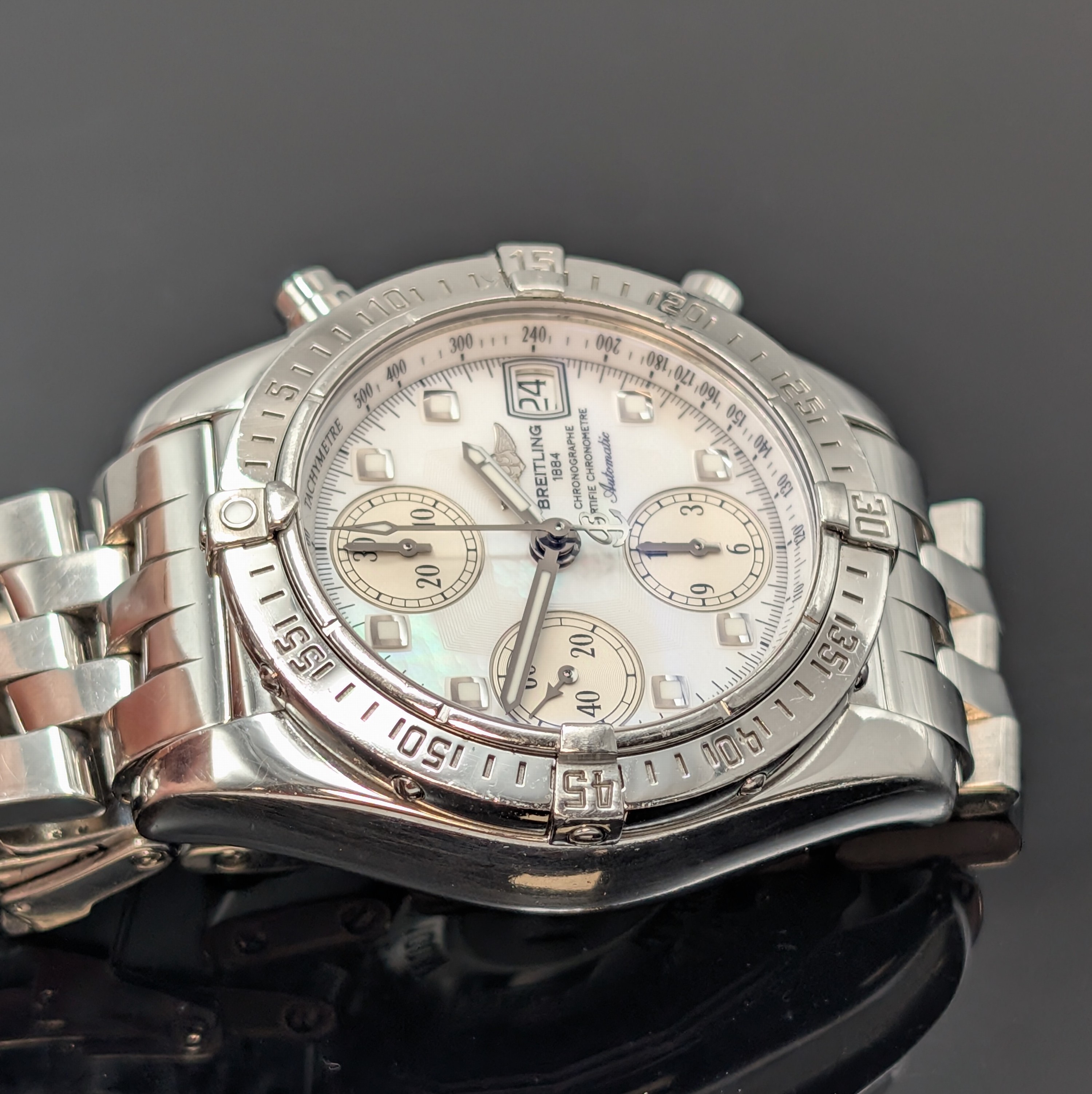 Detail g: BREITLING Herrenarmbanduhr Chrono Cockpit Referenz A13357, Automatik, Schweiz um 2007, Chronometer in Edelstahl inkl. Pilotband m. Faltschl., Boden ...