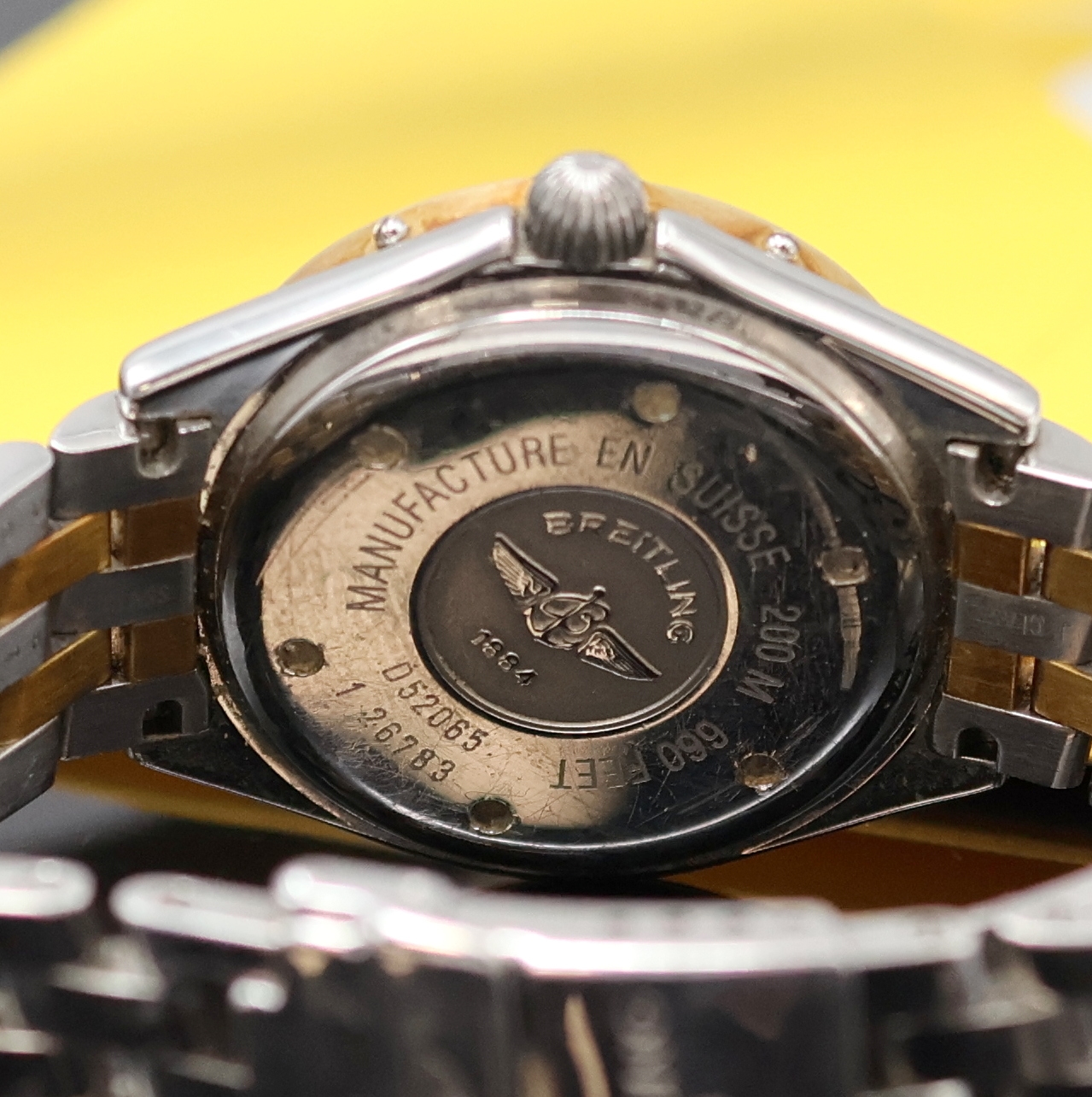 Detail e: BREITLING Damenarmbanduhr Lady J Referenz D52065, Schweiz verk. lt. beil. Garantie 06/1997, quarz, Edelstahl/Gold kombiniert inkl. Pilotband m. ...
