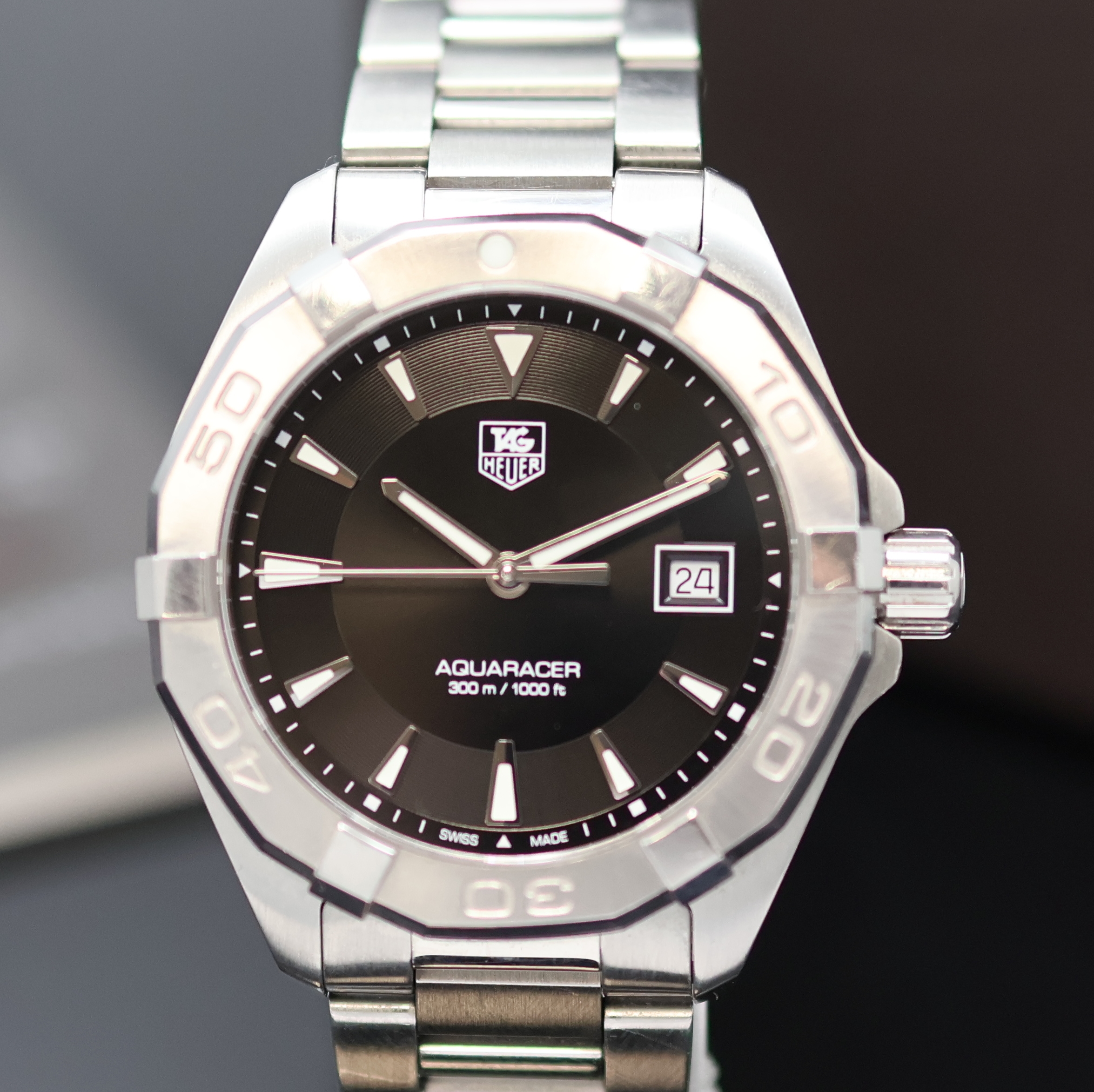 Detail b: TAG HEUER Aquaracer Herrenarmbanduhr Referenz WAY1110, Schweiz verk. lt. beil. Pap. 11/2014, quarz, Edelstahlgeh. inkl. orig. Gliederband m. ...