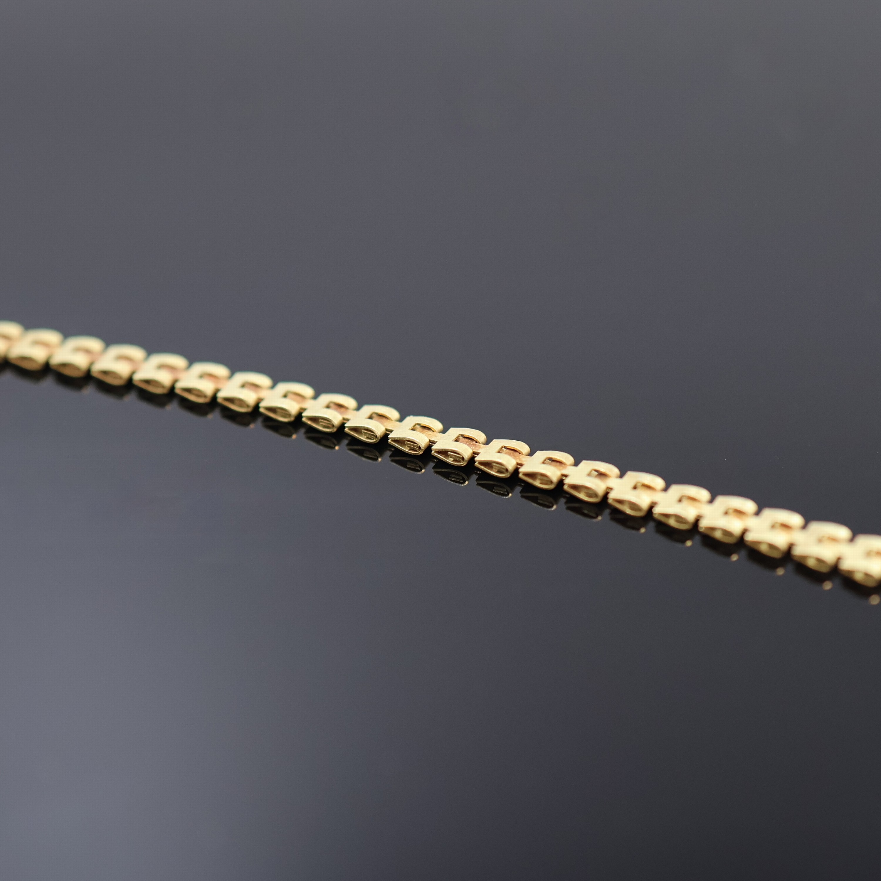 Detail a: Taschenuhrkette in GG 585/000, mit Federring, L. ca. 20 cm, Gew. ca. 4,5g