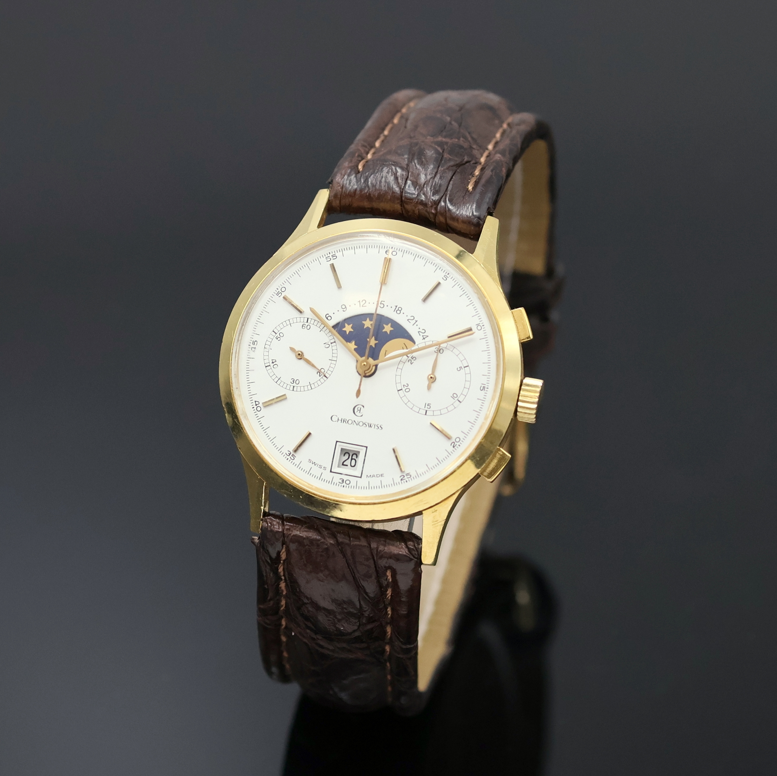 Detail a: CHRONOSWISS Herrenchronograph mit Mondphase in GG 750/000, Schweiz um 1990, Handaufzug, 3-teil. Geh., Boden u. Glasrand aufgedr., Korrekturdr. seitl. ...