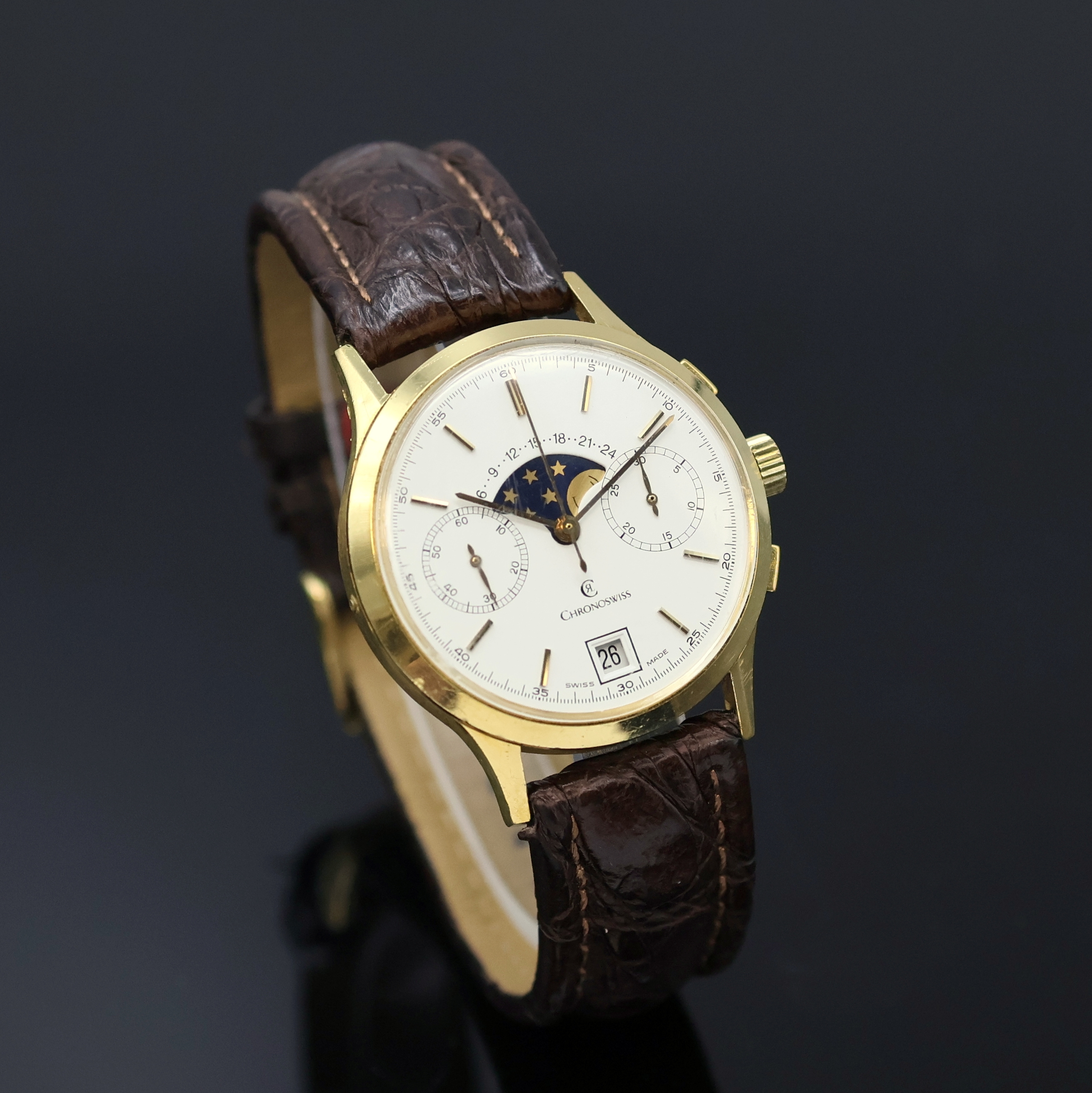 Detail b: CHRONOSWISS Herrenchronograph mit Mondphase in GG 750/000, Schweiz um 1990, Handaufzug, 3-teil. Geh., Boden u. Glasrand aufgedr., Korrekturdr. seitl. ...