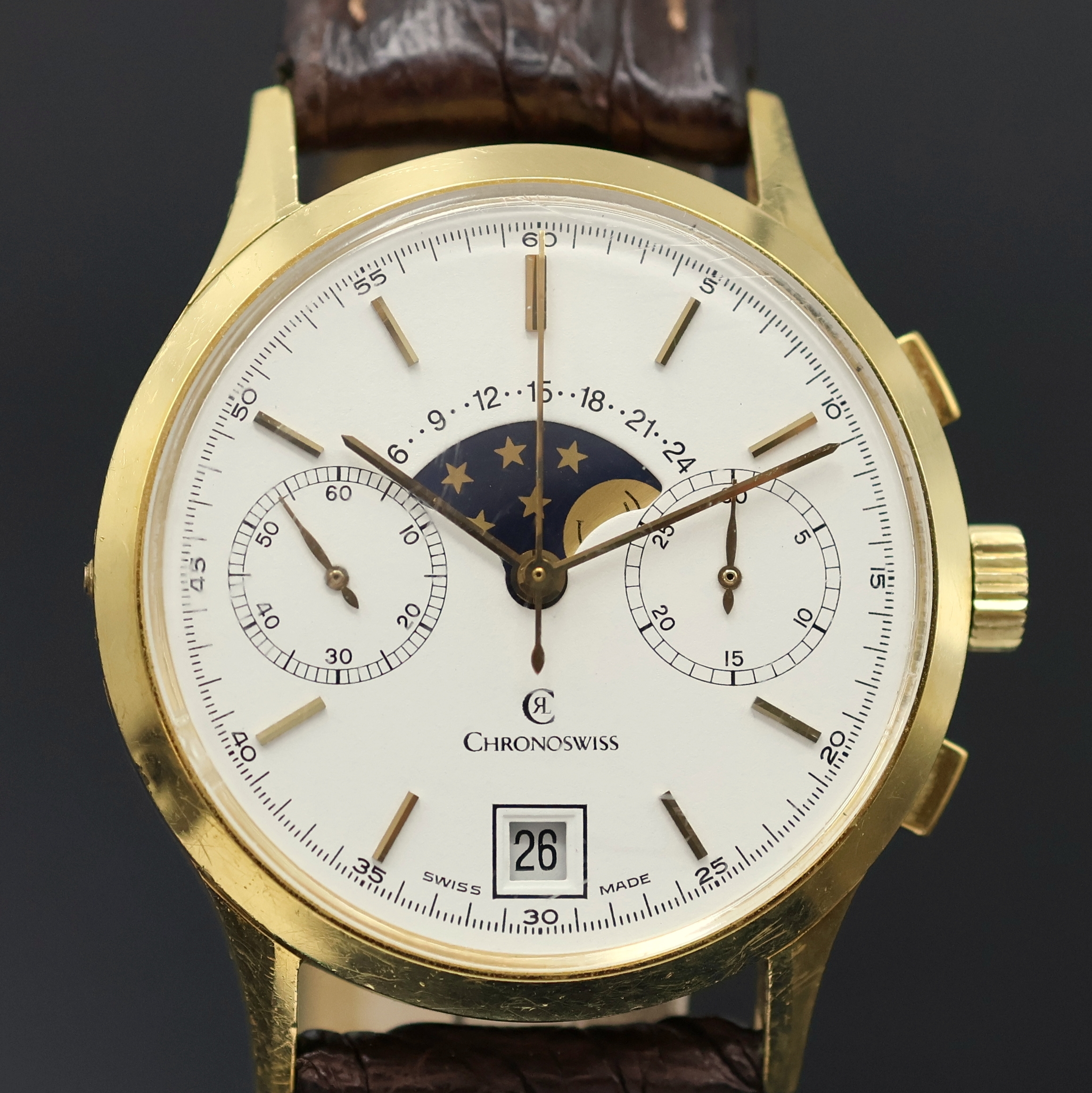 Detail c: CHRONOSWISS Herrenchronograph mit Mondphase in GG 750/000, Schweiz um 1990, Handaufzug, 3-teil. Geh., Boden u. Glasrand aufgedr., Korrekturdr. seitl. ...