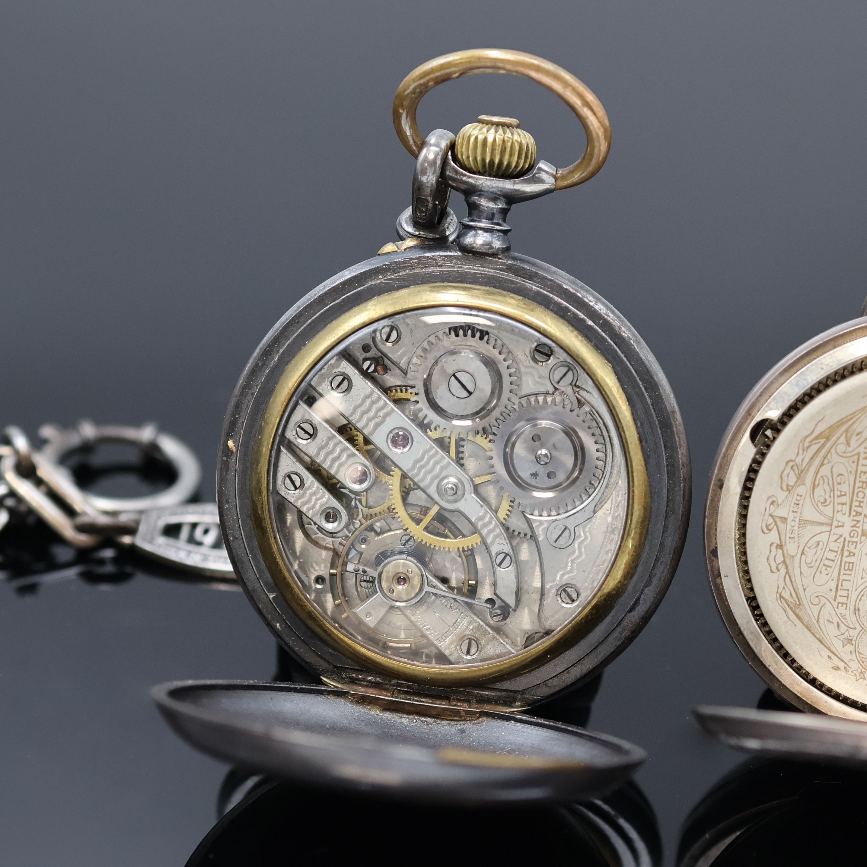Detail h: HEBDOMAS 8 Tage Taschenuhr sowie eine Savonette mit Kalender, Schweiz/England um 1910/1915, 1.) Hebdomas im englischen Sterlingsilber Geh. (dell.), ...