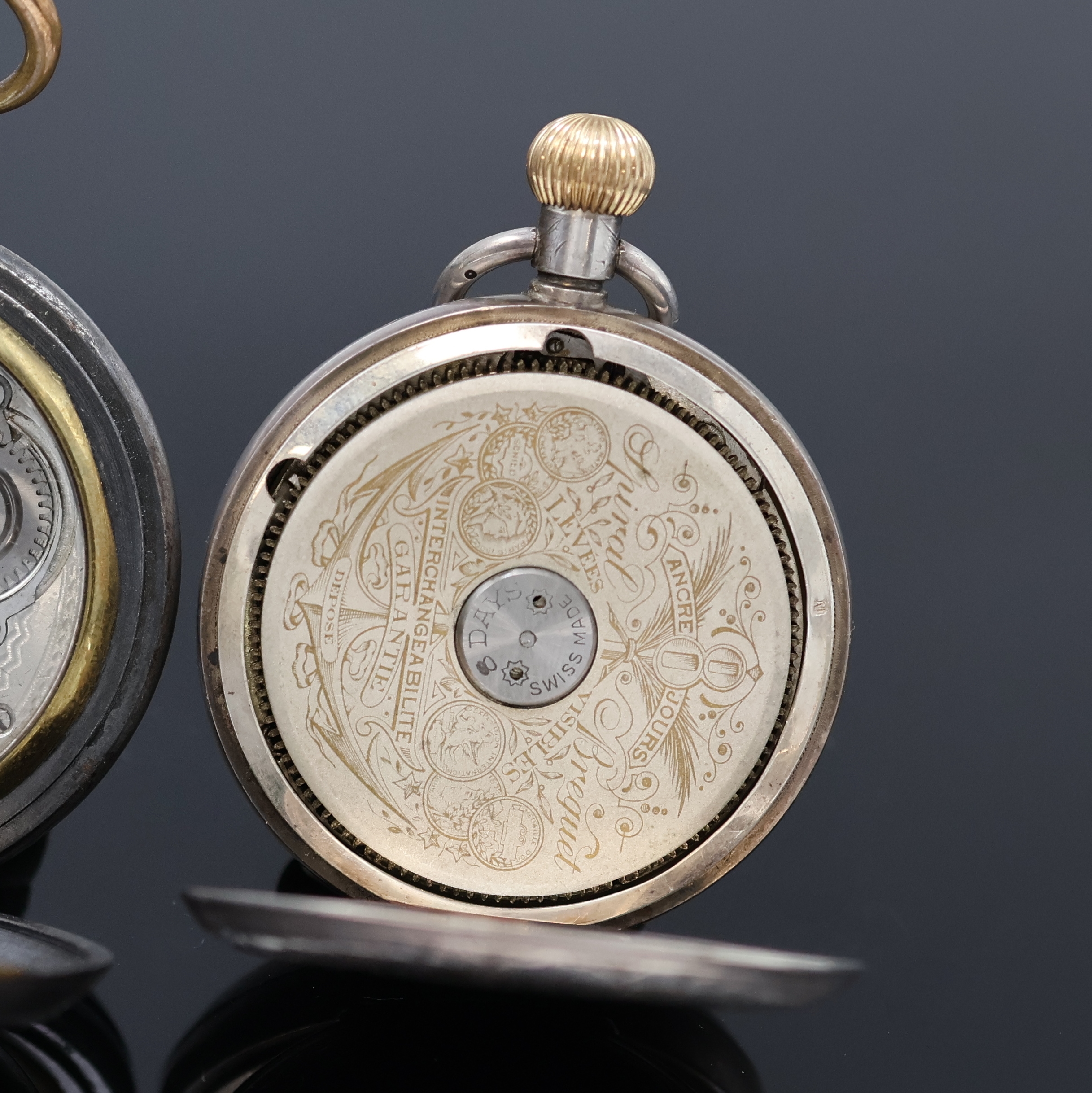 Detail i: HEBDOMAS 8 Tage Taschenuhr sowie eine Savonette mit Kalender, Schweiz/England um 1910/1915, 1.) Hebdomas im englischen Sterlingsilber Geh. (dell.), ...