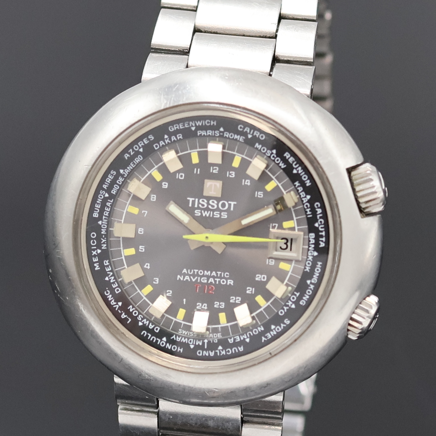 Detail a: TISSOT Navigator T12 Herrenarmbanduhr mit Weltzeitanzeige Referenz 44596, Schweiz um 1970, Automatik, massives Edelstahlgeh. inkl. orig. Gliederband ...