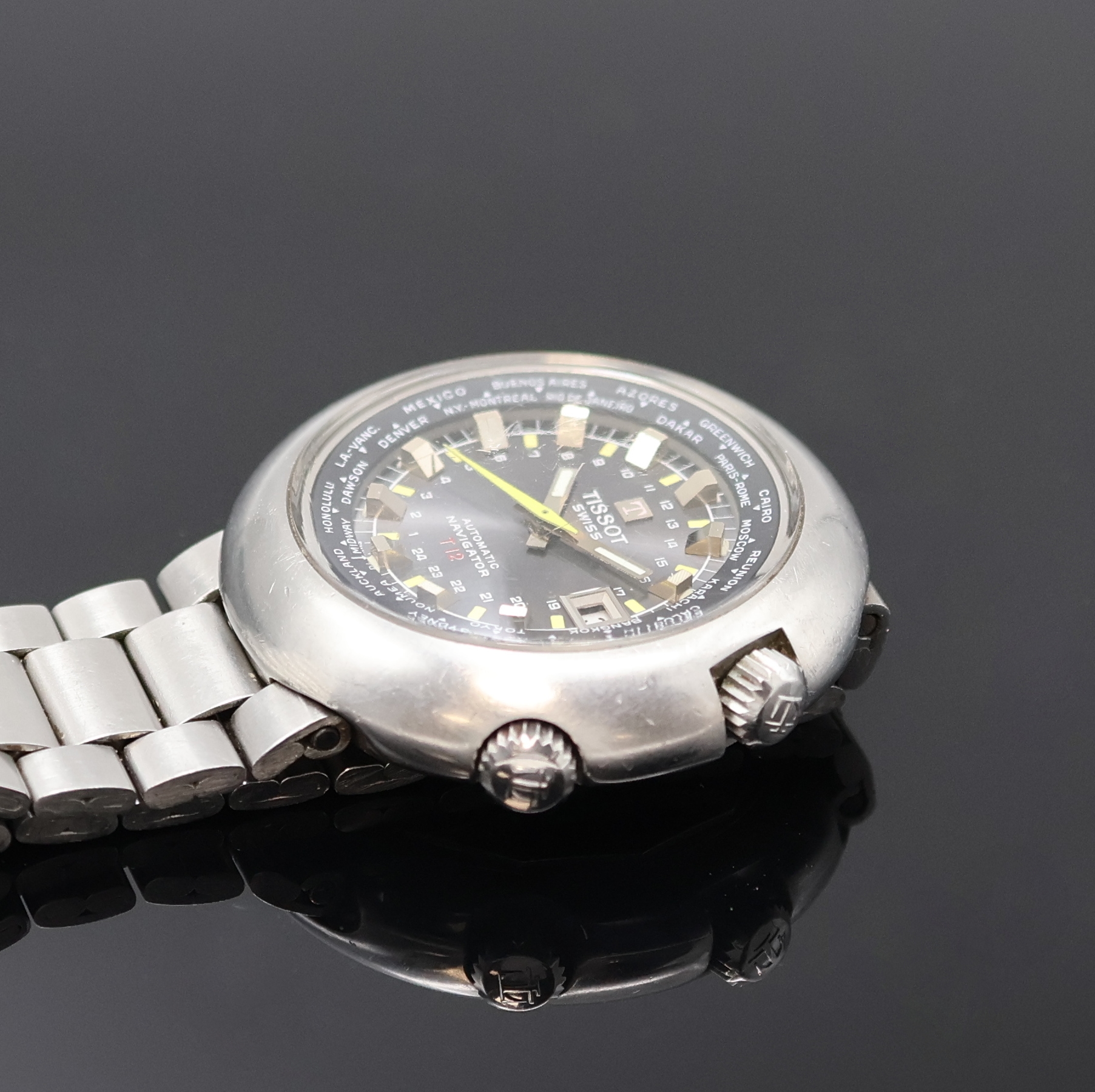 Detail c: TISSOT Navigator T12 Herrenarmbanduhr mit Weltzeitanzeige Referenz 44596, Schweiz um 1970, Automatik, massives Edelstahlgeh. inkl. orig. Gliederband ...
