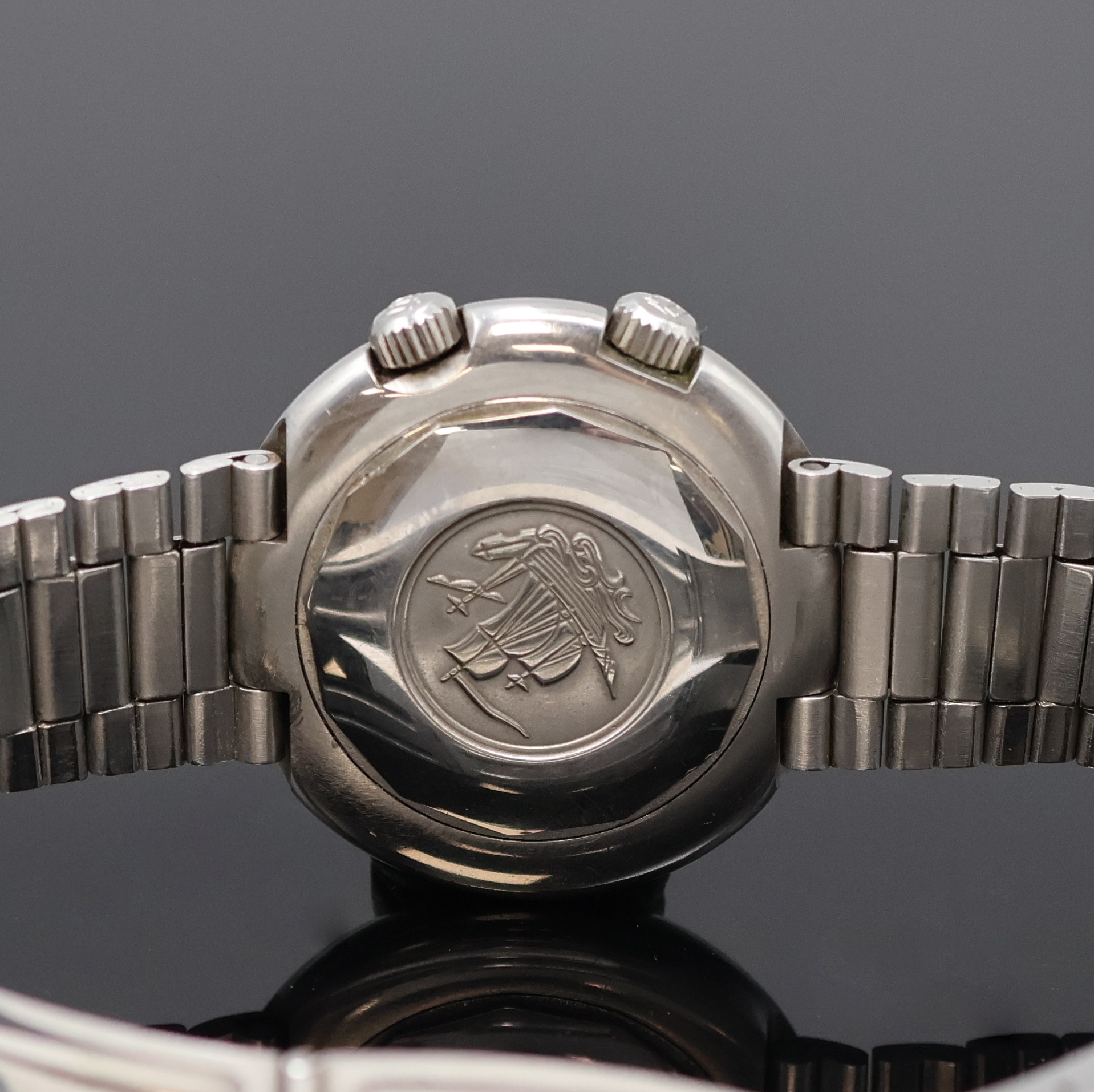 Detail d: TISSOT Navigator T12 Herrenarmbanduhr mit Weltzeitanzeige Referenz 44596, Schweiz um 1970, Automatik, massives Edelstahlgeh. inkl. orig. Gliederband ...