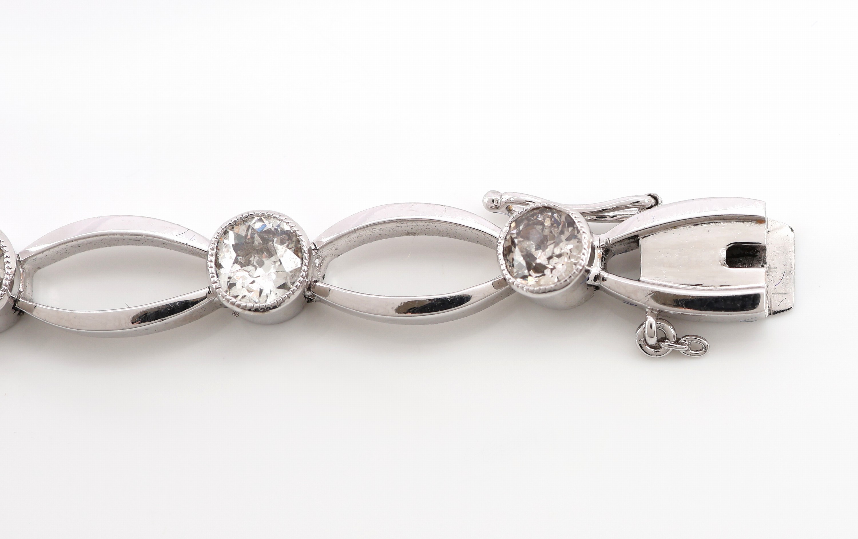 Detail c: 14 kt Gold Art Deco Diamant-Armband, um 1920- 30, WG 585/000 gepr., 9 Altschliffdiamantenzus. ca. 3.45 ct Weiß-get.Weiß/p, 3 Glieder bes. mit ...