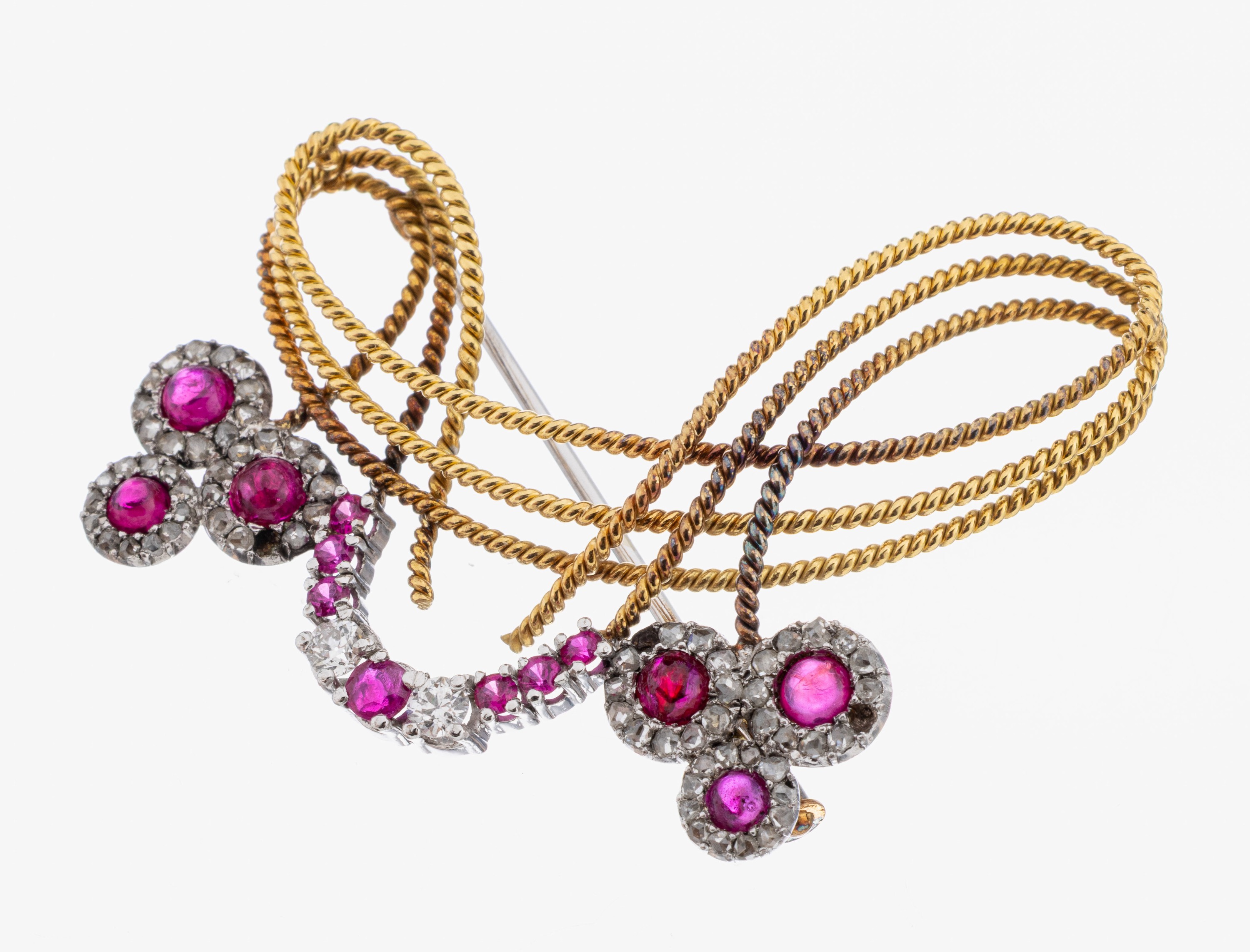Image 27057505 - 18 kt Gold Rubin-Diamant-Brosche, WG/GG 750/000, GG Kordelverzierung in abstrakter ...