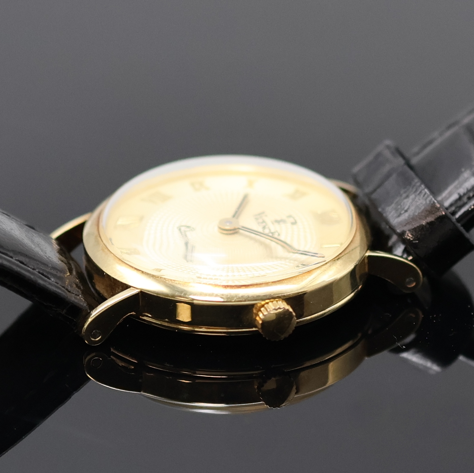Detail b: VICENCE Milor Armbanduhr in GG 585/000, Schweiz um 2000, quarz, Boden aufgedr., champagnerfarb. Zifferbl. im Zentrum guill., röm. Zahlen, gold. ...