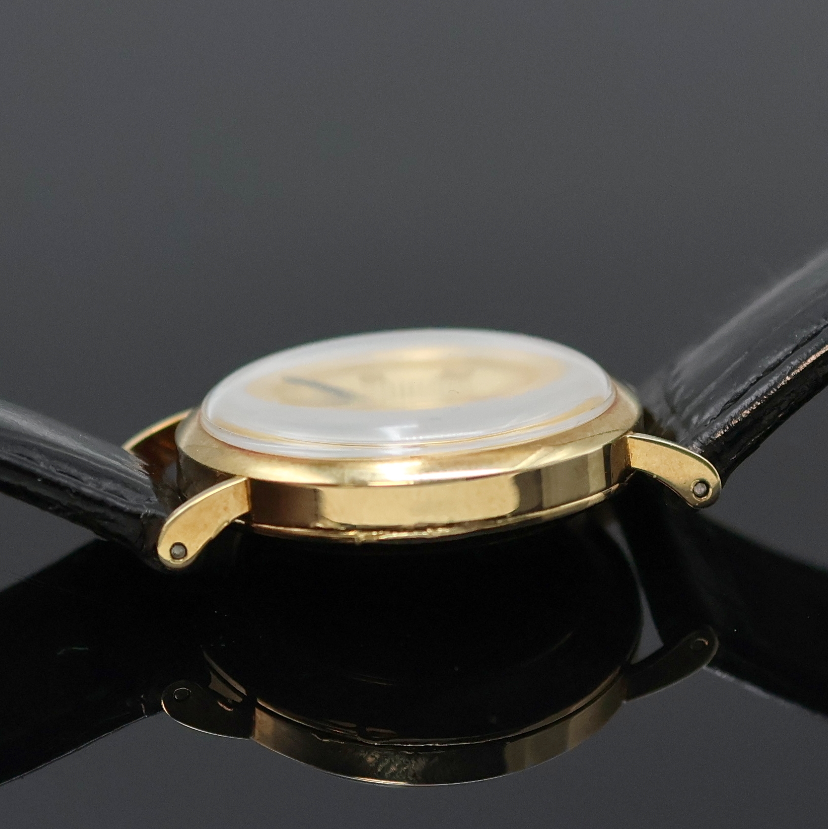 Detail c: VICENCE Milor Armbanduhr in GG 585/000, Schweiz um 2000, quarz, Boden aufgedr., champagnerfarb. Zifferbl. im Zentrum guill., röm. Zahlen, gold. ...