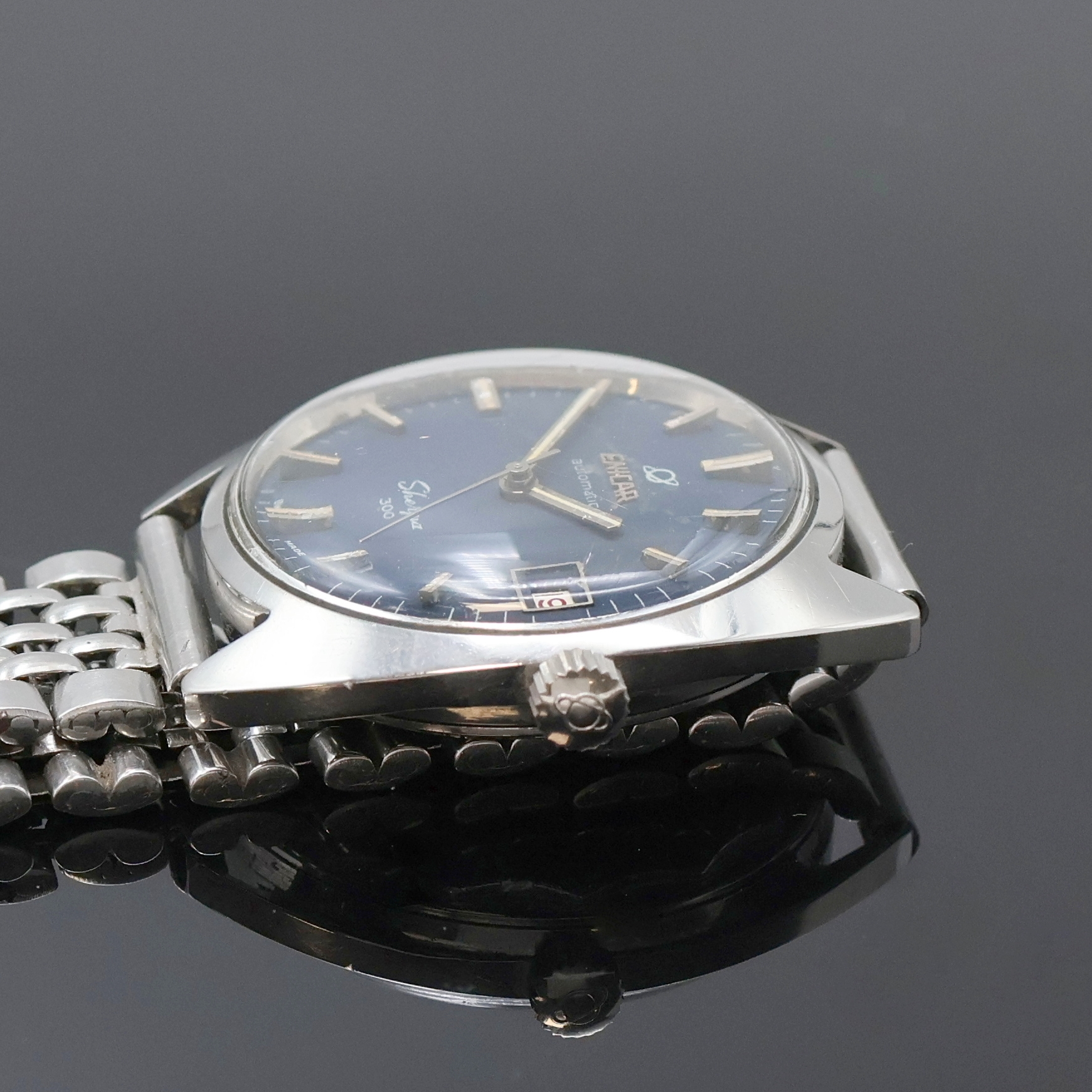 Detail c: ENICAR Sherpa 300 Armbanduhr in Stahl an Stahlband Referenz 144-39-16, Schweiz 1970er Jahre, Edelstahlgeh. inkl. orig. Gliederband m. Faltschl., ...