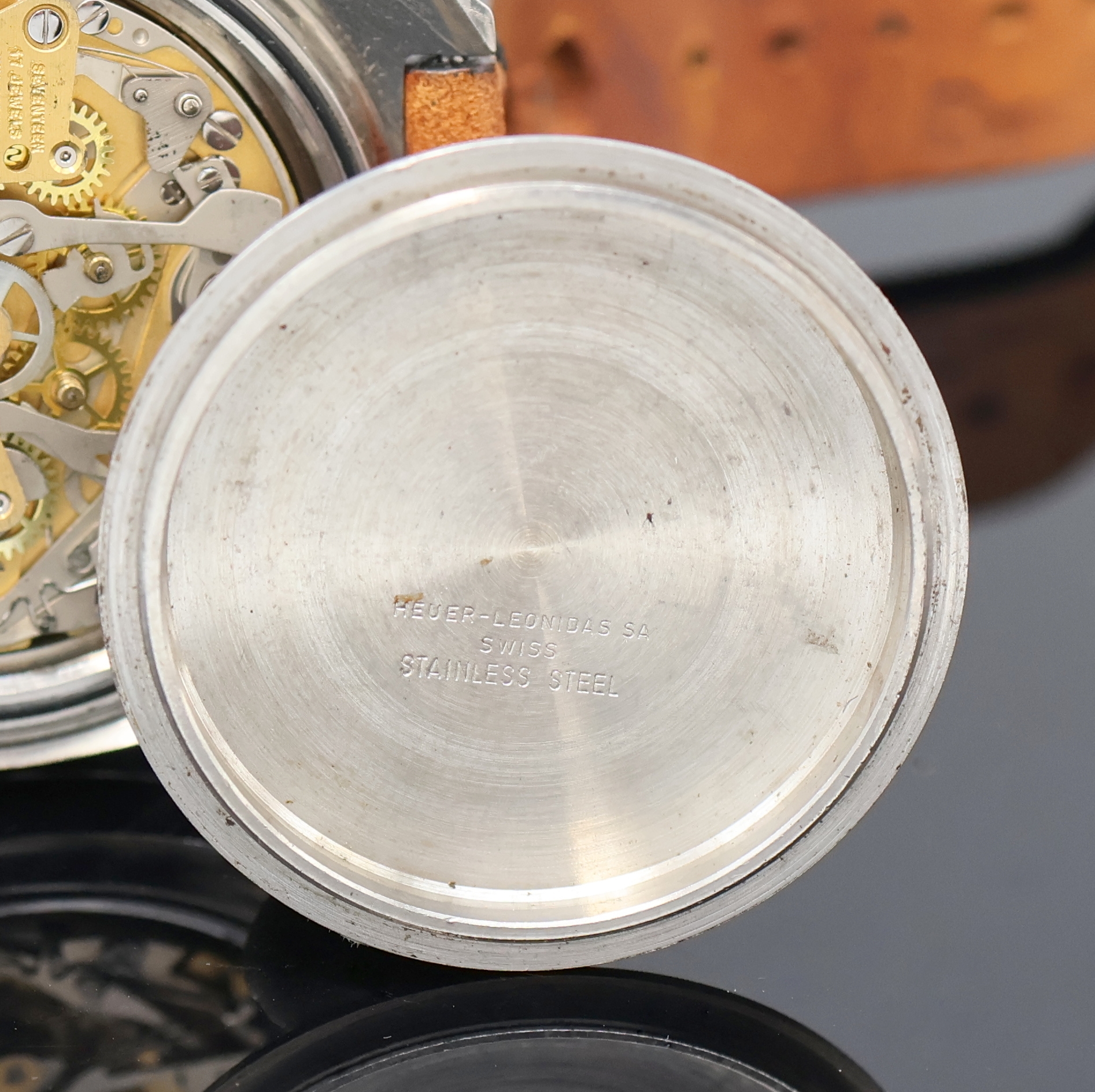 Detail g: HEUER Autavia Armbandchronograph Referenz 1163V, Schweiz um 1972, Automatik, Edelstahlgeh., Boden verschr., Krone außen 9, Lünette mit ...