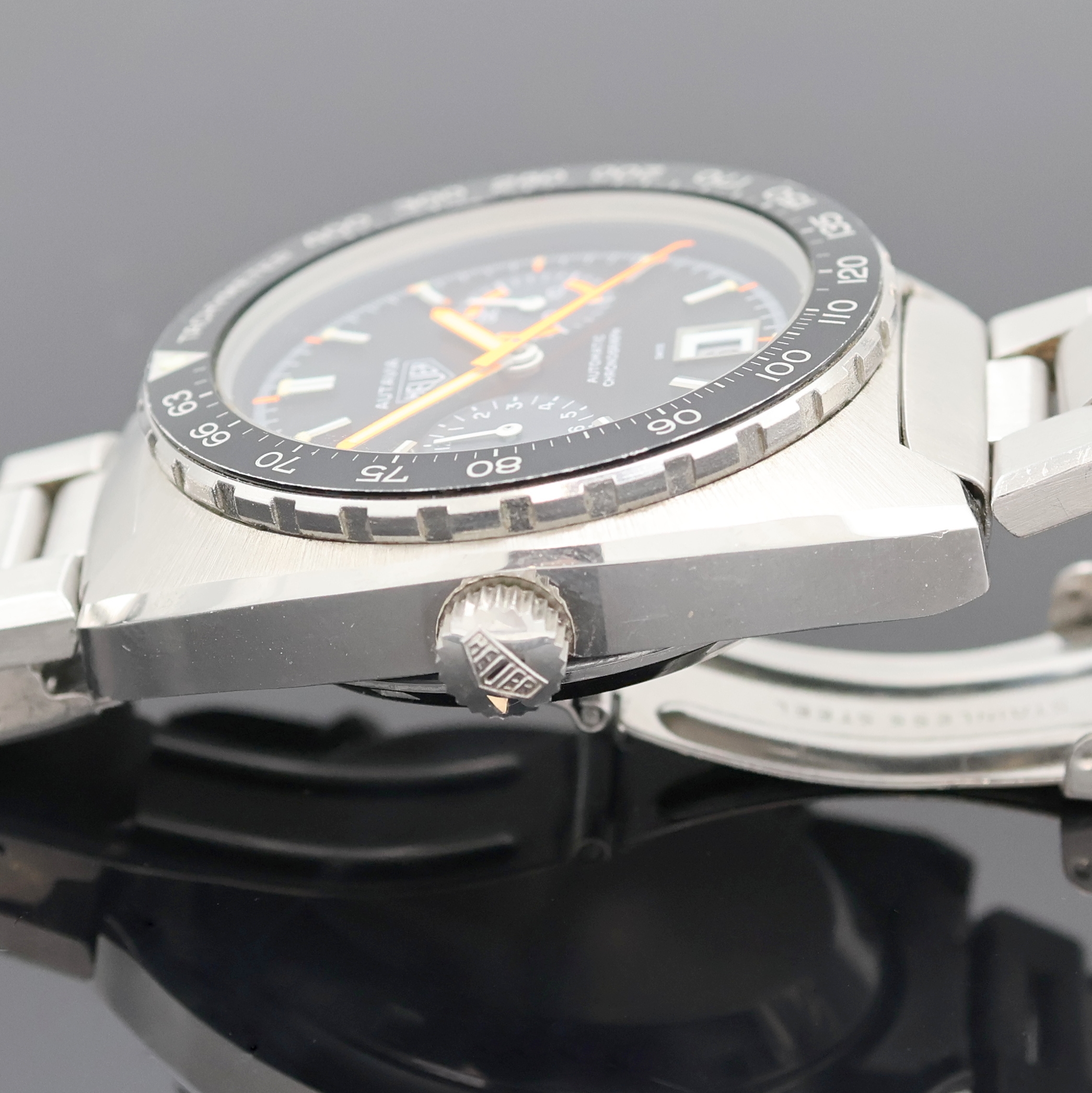 Detail d: HEUER Autavia "Orange Boy" seltener Armbandchronograph Referenz 11630, Automatik, Schweiz um 1975, Edelstahlgeh. inkl. orig. Gliederband m. ...