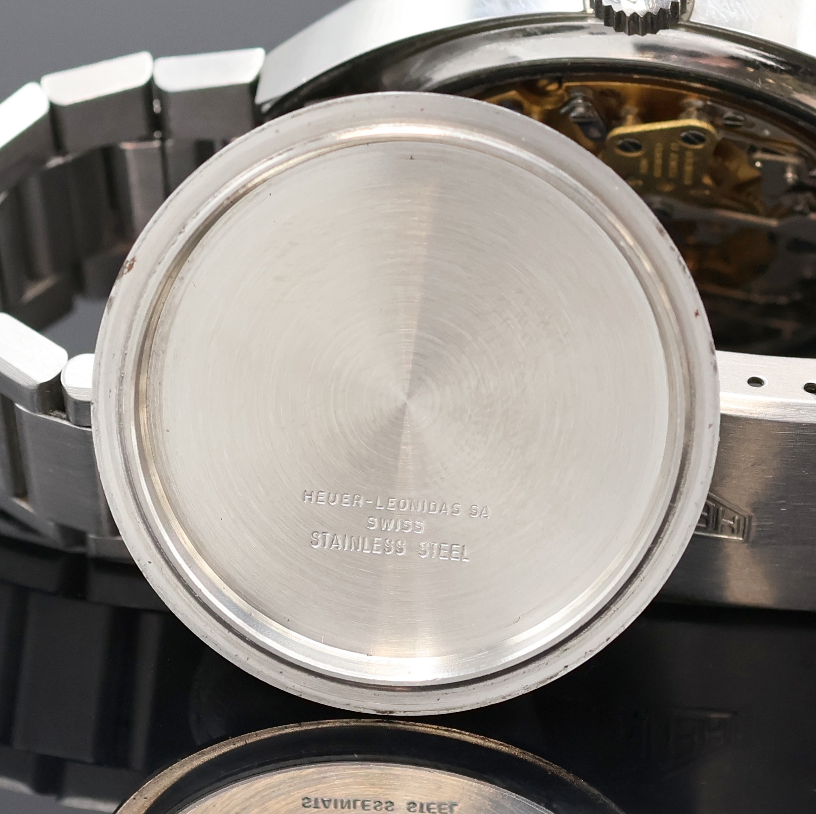 Detail h: HEUER Autavia "Orange Boy" seltener Armbandchronograph Referenz 11630, Automatik, Schweiz um 1975, Edelstahlgeh. inkl. orig. Gliederband m. ...