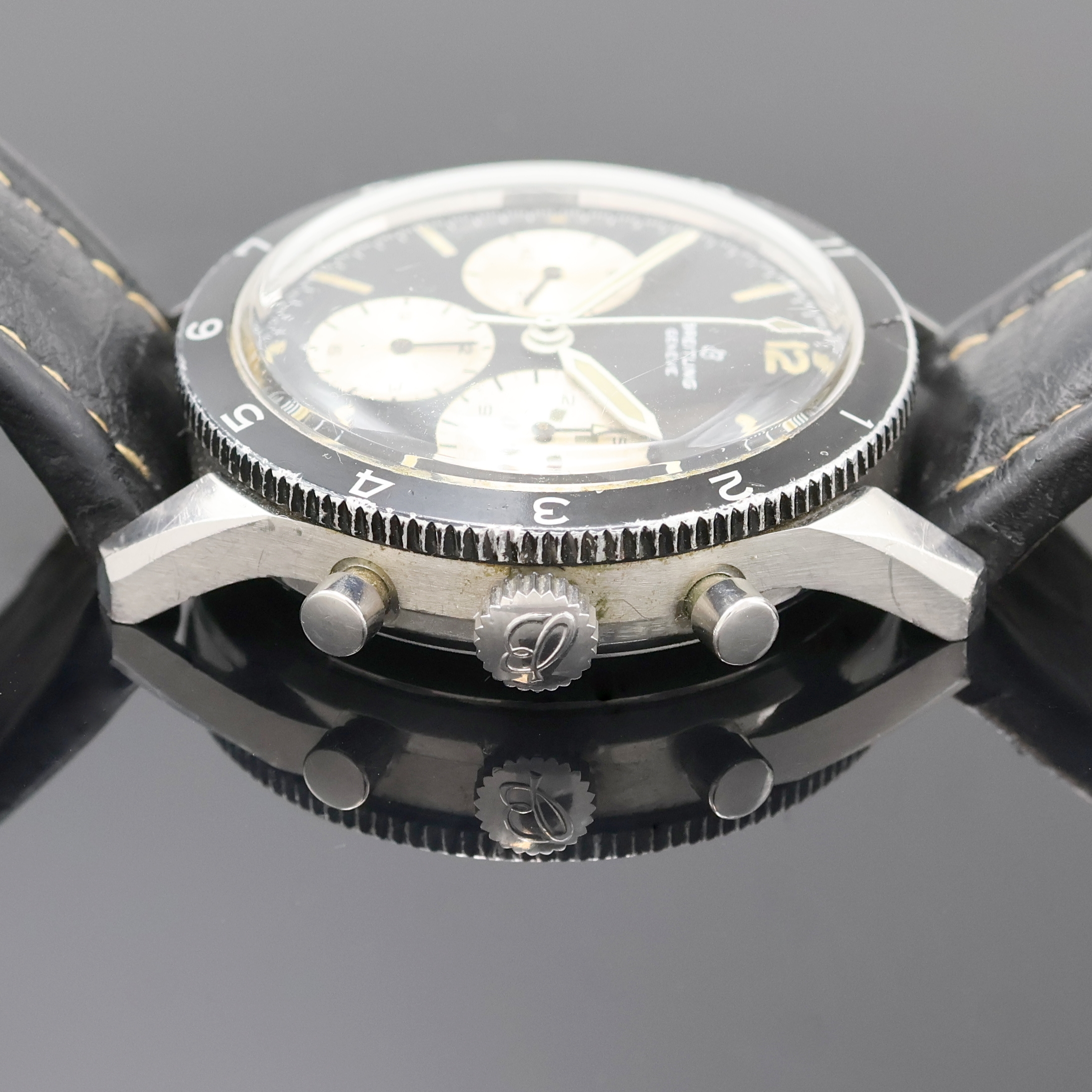 Detail d: BREITLING 765 Co-Pilot Armbandchronograph, Schweiz um 1967, Handaufzug, Edelstahlgeh. inkl. Breitling Lederband m. Dornschl., Lünette m. 12er ...