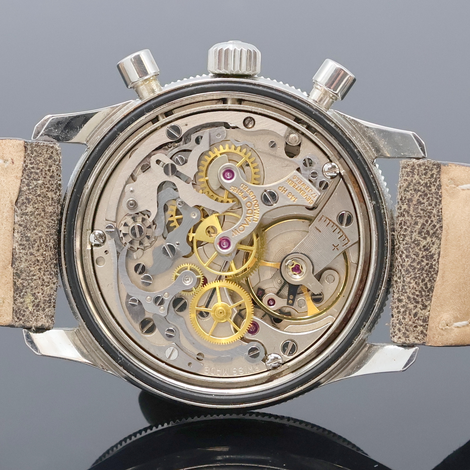 Detail e: MOVADO Super Sub Sea Armbandchronograph, Schweiz um 1968, Handaufzug, verschr. Stahlgeh. m. beids. drehb. "Faded" Lünette m. 60er Teilung, ...