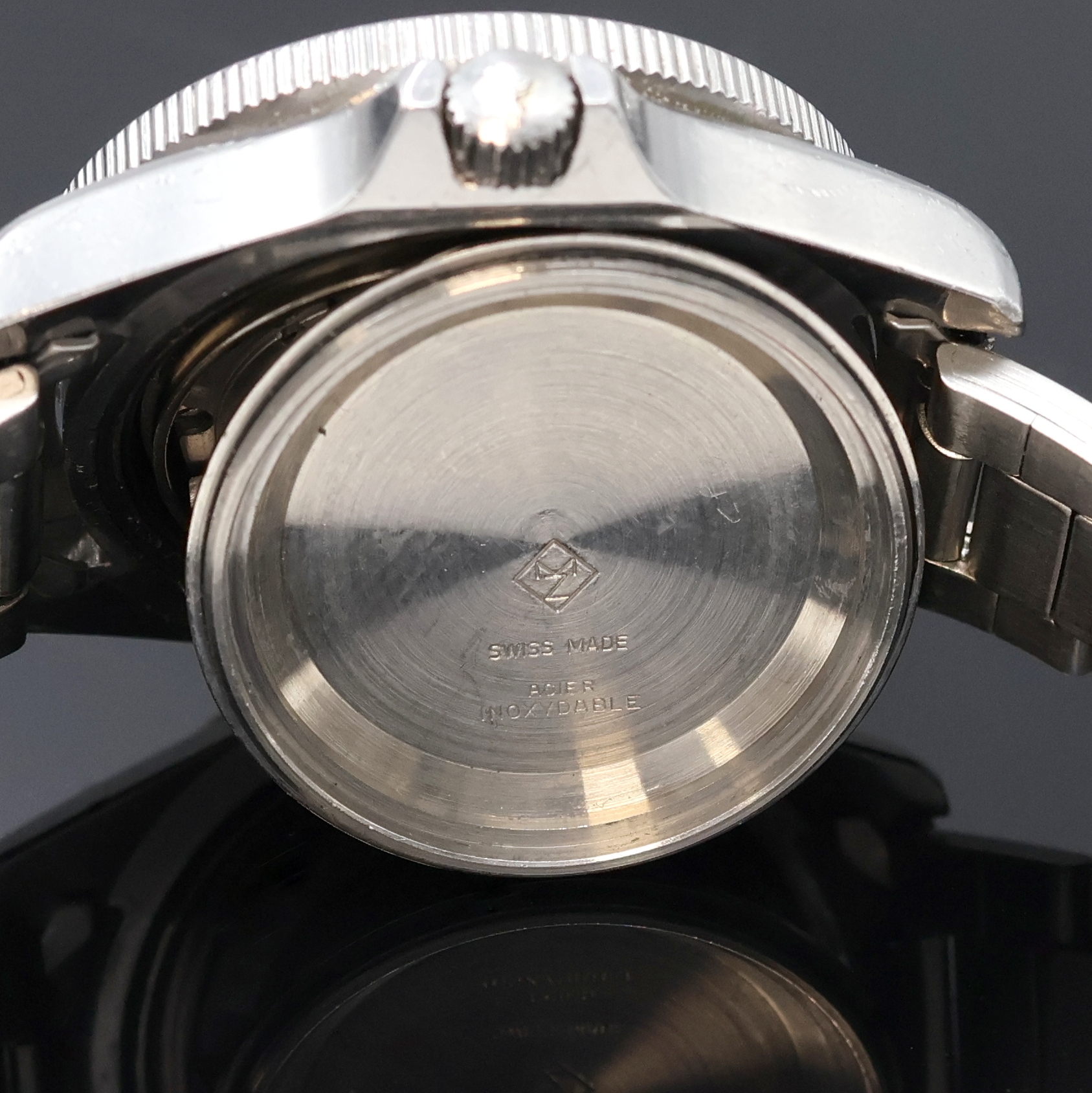 Detail g: MOVADO ZENITH Taucherarmbanduhr in Stahl, Schweiz um 1970, Automatik, Boden u. Krone verschr., neutr. Gliederband m. Faltschl., Lünette m. 60er ...