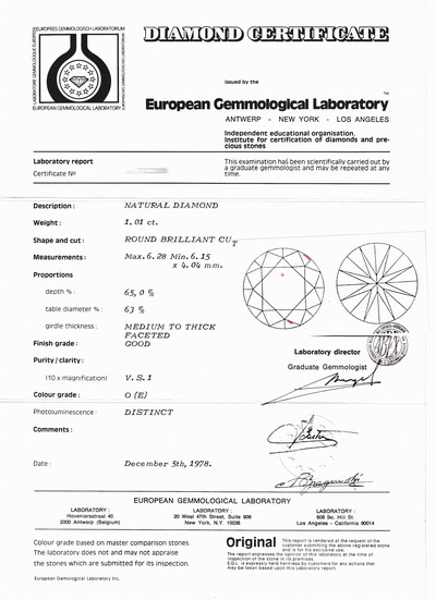 27058152a - 18 kt Gold Brillant-Ring, WG 750/000, mittig Brillant ca. 1.01 ct hochfeines ...