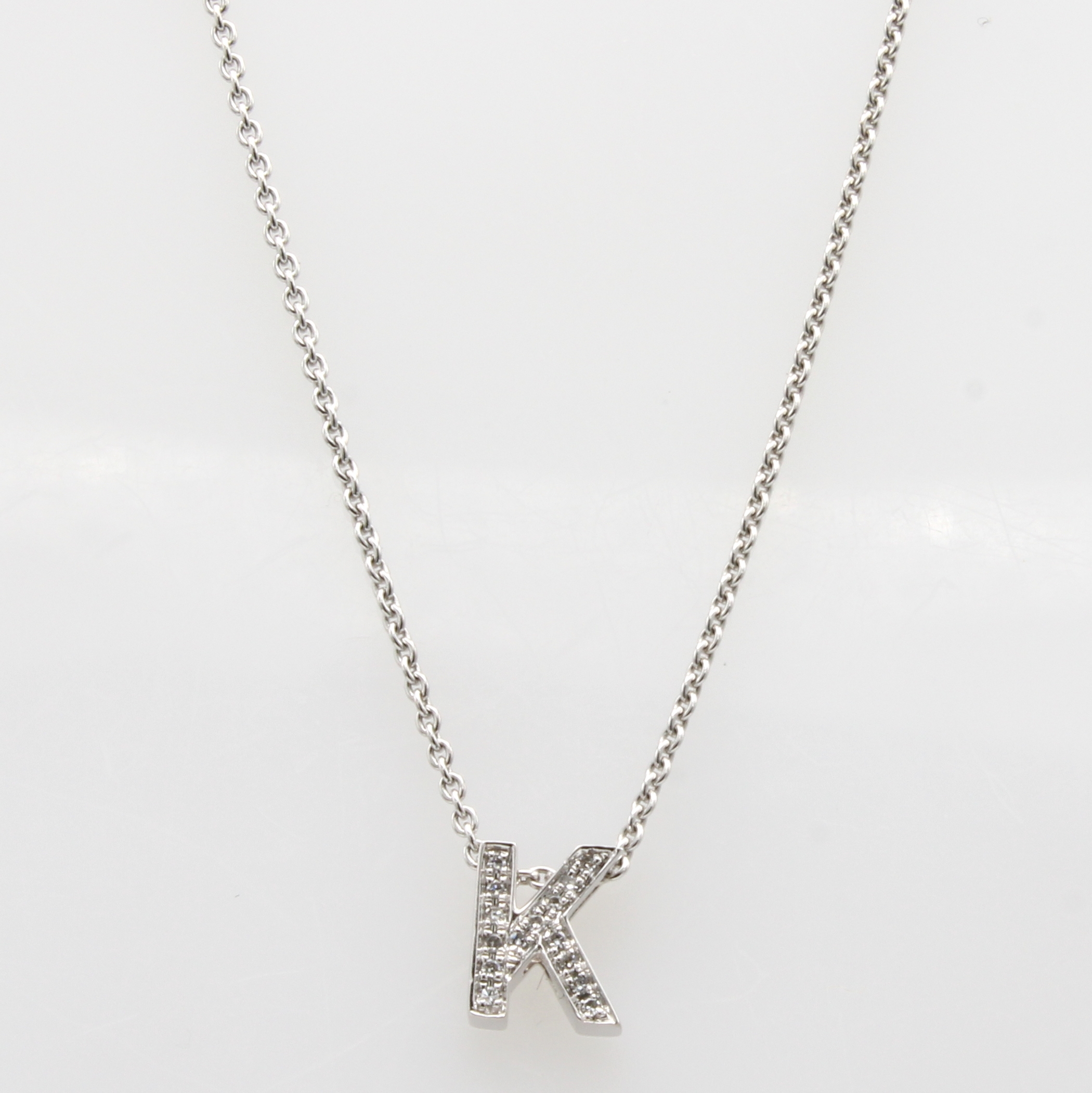 Image 27058585 - Anhänger mit Brillanten ´K´ an Kette, WG 750/000, WG 750/000, 15 Brill. zus. ca. ...