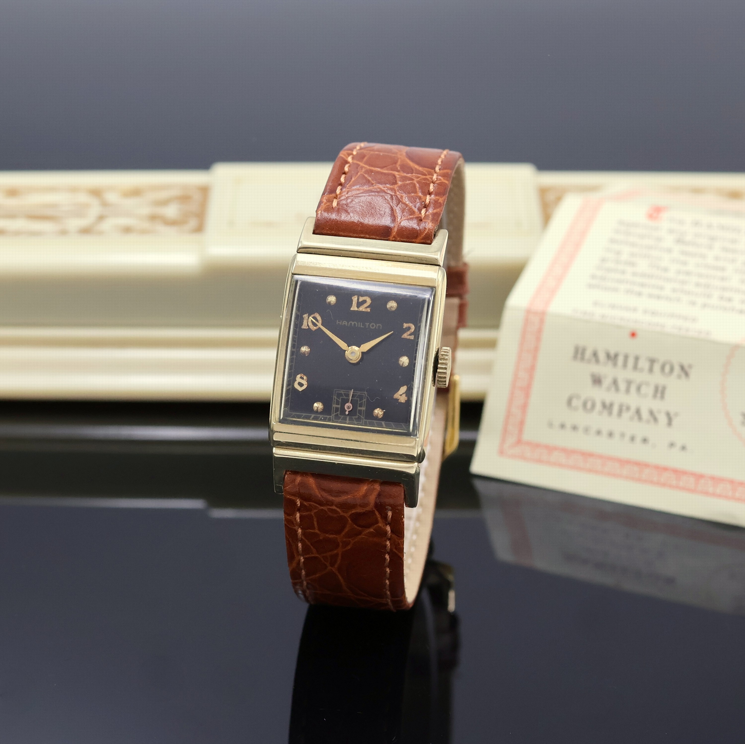 Image 27059052 - HAMILTON 14k yellow gold wristwatch, USA around 1950, two-piece construction, rectangular ...
