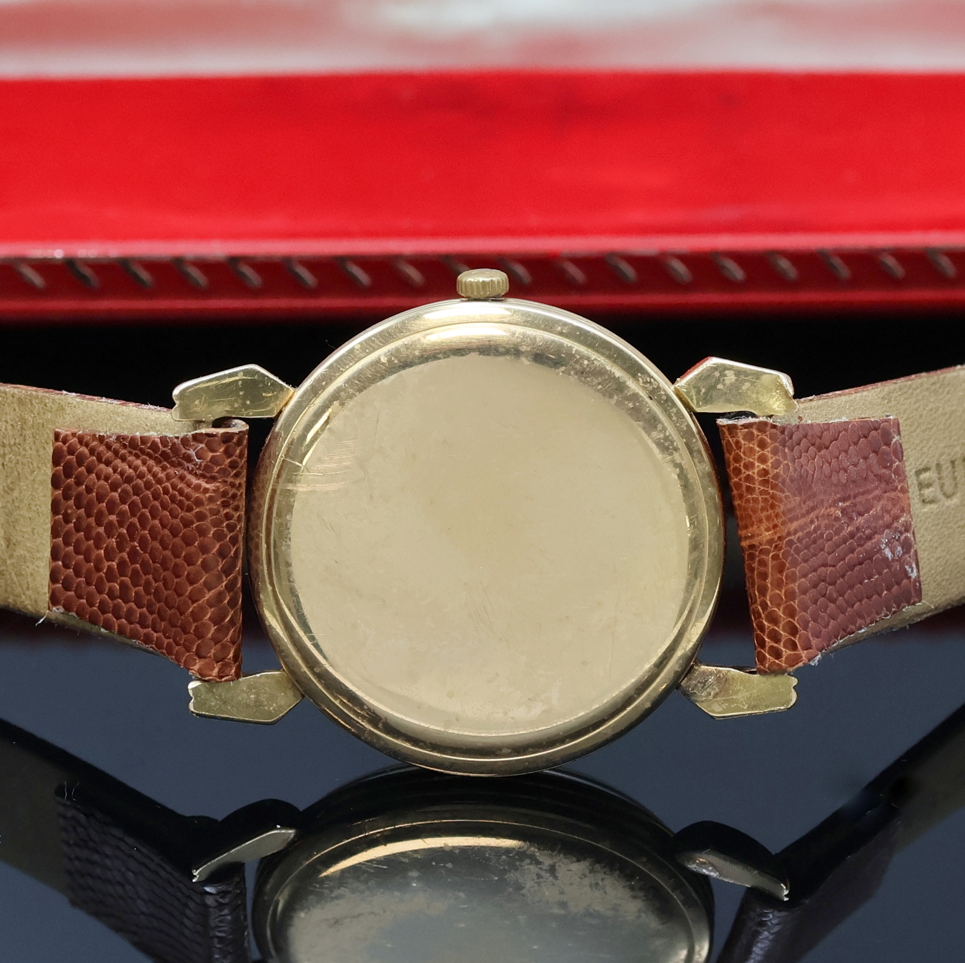 Detail c: MOVADO Armbanduhr in GG 750/000, Schweiz um 1940, Handaufzug, 3-teil. Geh. mit ausgef. Bandanst. rep./dell., Boden und Glasrand aufgedr., silb. ...