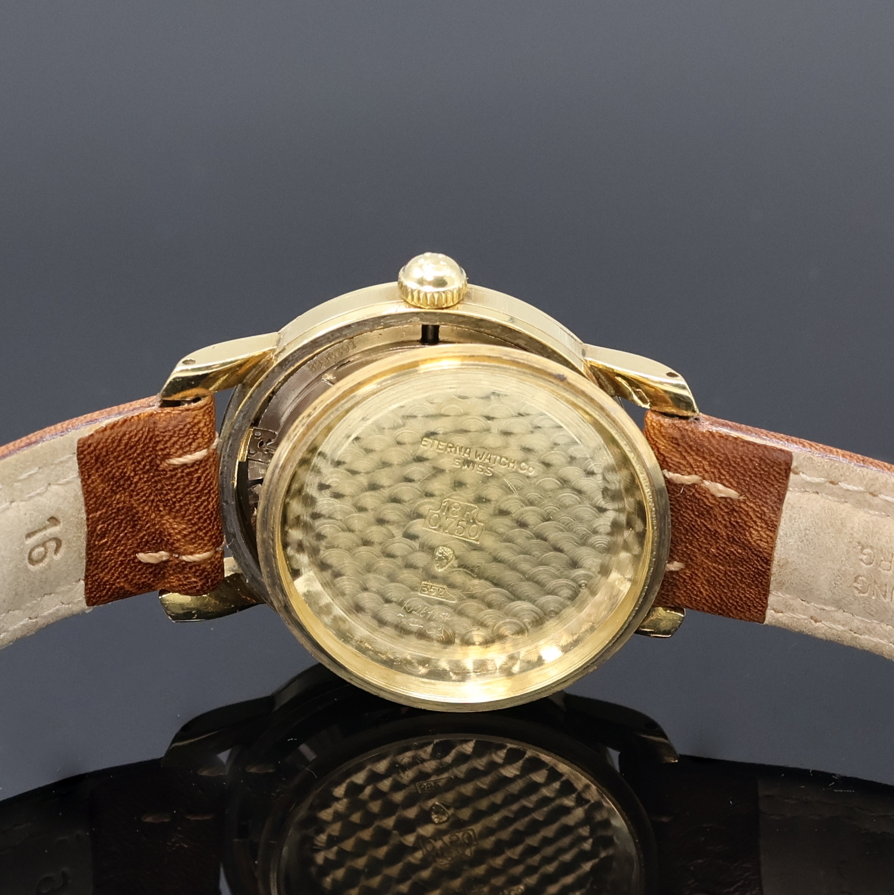 Detail f: ETERNA MATIC Herrenarmbanduhr in GG 585/000, Schweiz um 1950, Automatik, 2-teil. Geh., Boden verschr., silb. Duoton-Zifferbl., gold. Indizes und ...