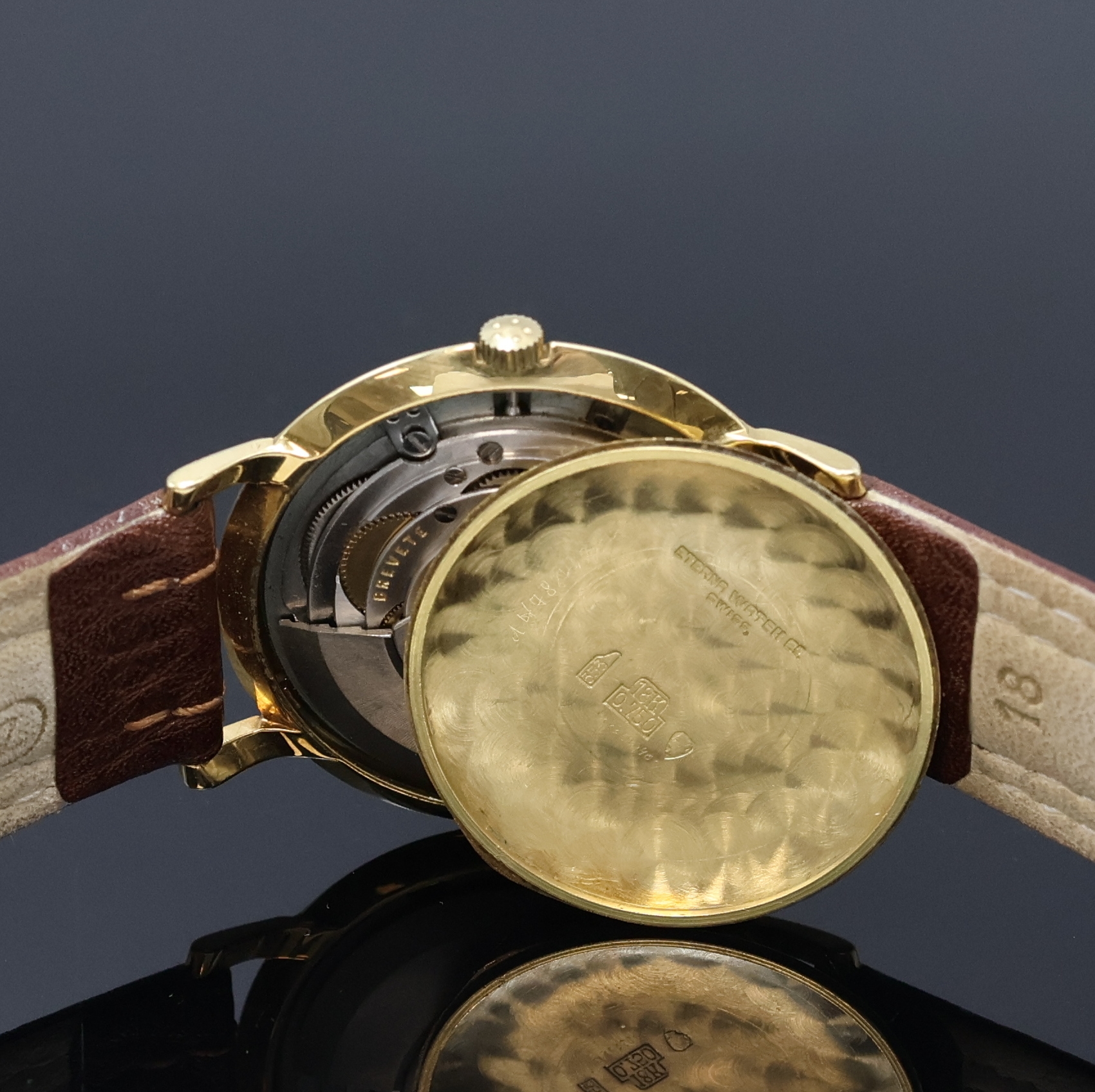 Detail f: ETERNA MATIC Centenaire Herrenarmbanduhr in GG 585/000, Schweiz um 1960, Automatik, 2- teil. Geh., Boden aufgedr., am Rand radial guill., silb. ...