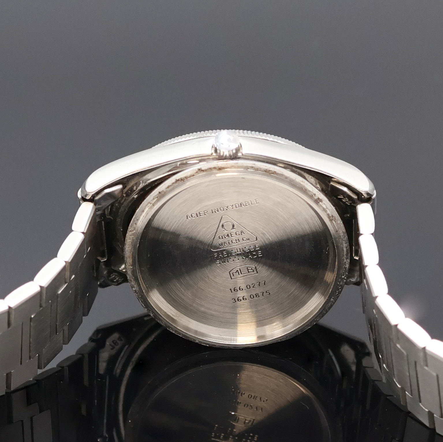 Detail g: OMEGA Seamaster Herrenarmbanduhr in Stahl Referenz 166.0277, Schweiz um 1982, Automatik, 3-teil. Geh., Boden m. Seepferdchenlogo verschr., geriffelte ...