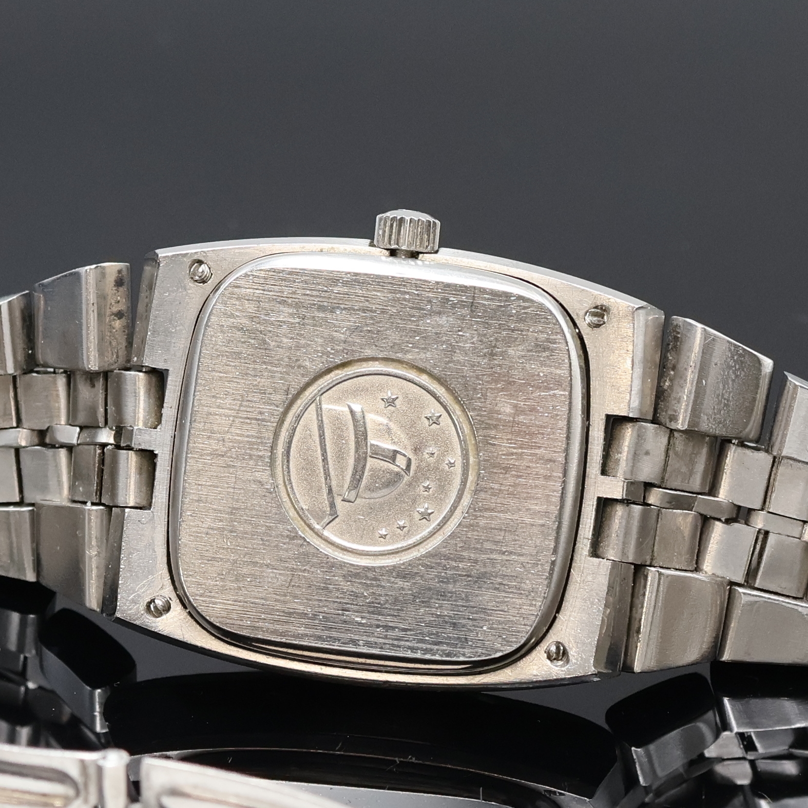Detail d: OMEGA Constellation Herrenarmbanduhr in Stahl Referenz 168.0059, Schweiz um 1974, Automatik, 4-fach verschr. TV-Screen Geh. m. integr. Stahlband Ref. ...