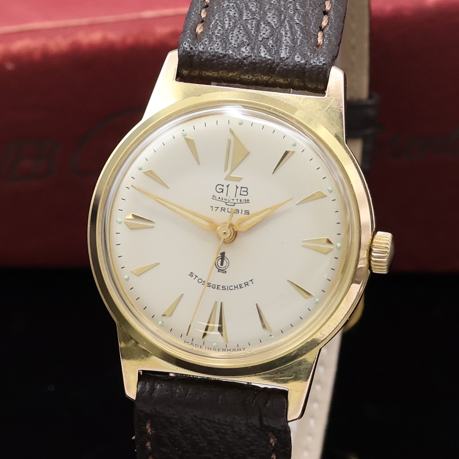 Detail a: GUB Q1 vergoldete Armbanduhr mit original Box, DDR um 1960, Handaufzug, 2-tlg. Geh. m. aufgedr. Stahlboden, silb. Zifferbl., gold. Indizes u. Zeiger, ...