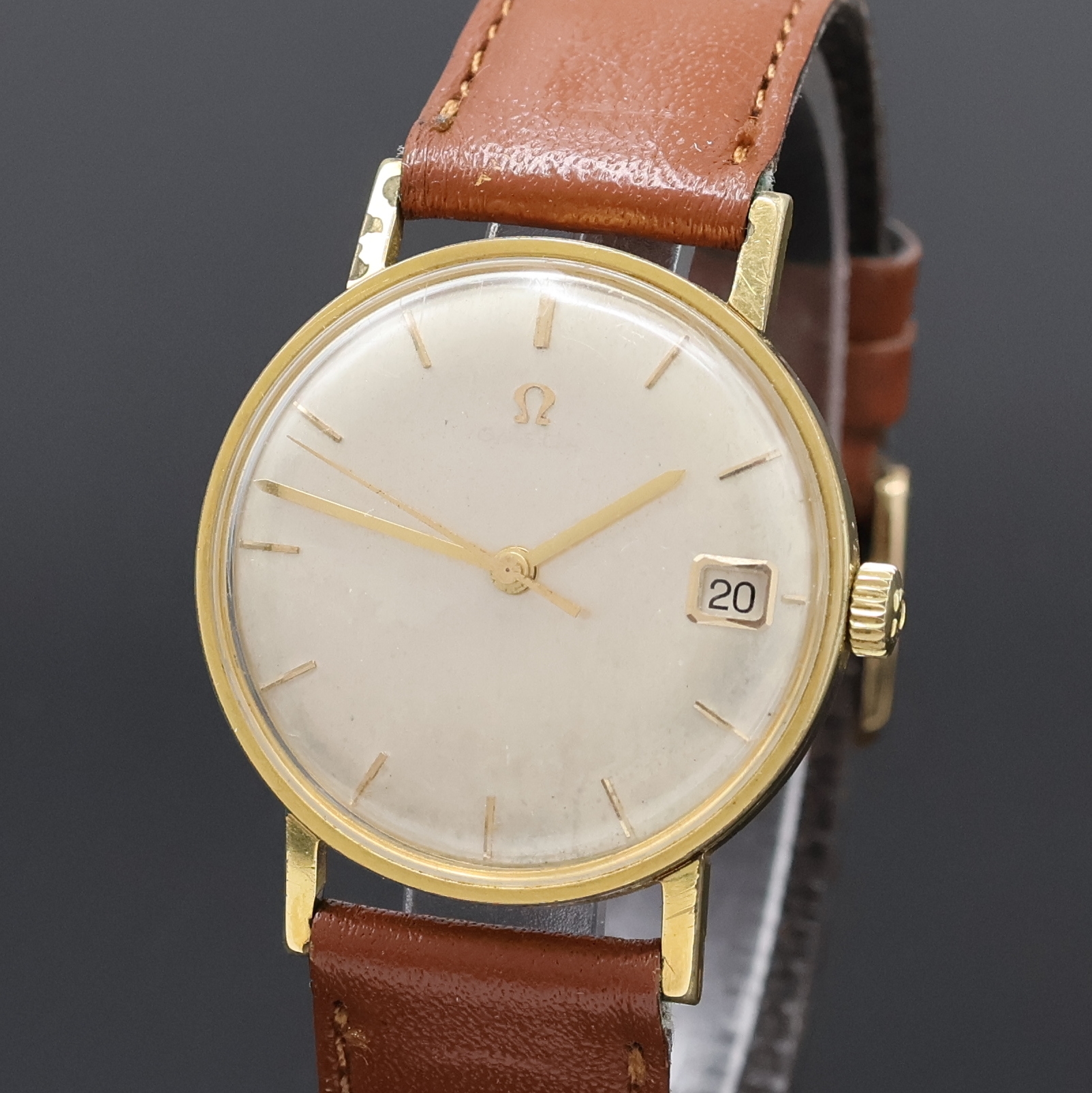 Detail a: OMEGA vergoldete Herrenarmbanduhr Referenz 14731SC62, Schweiz um 1962, Handaufzug, 3- tlg. Geh., Glasrand u. korr./rep. Stahlboden aufgedr., orig. ...