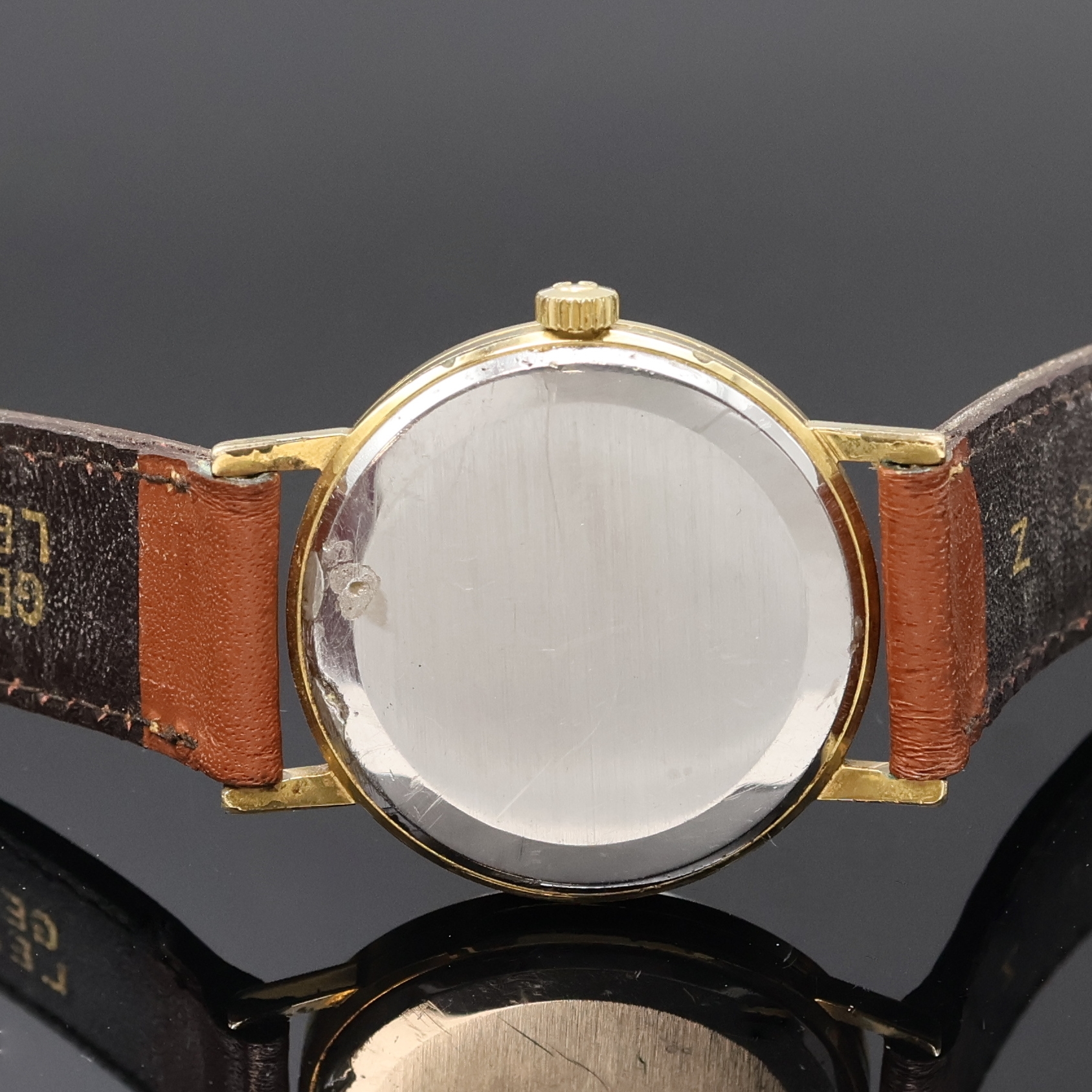 Detail c: OMEGA vergoldete Herrenarmbanduhr Referenz 14731SC62, Schweiz um 1962, Handaufzug, 3- tlg. Geh., Glasrand u. korr./rep. Stahlboden aufgedr., orig. ...