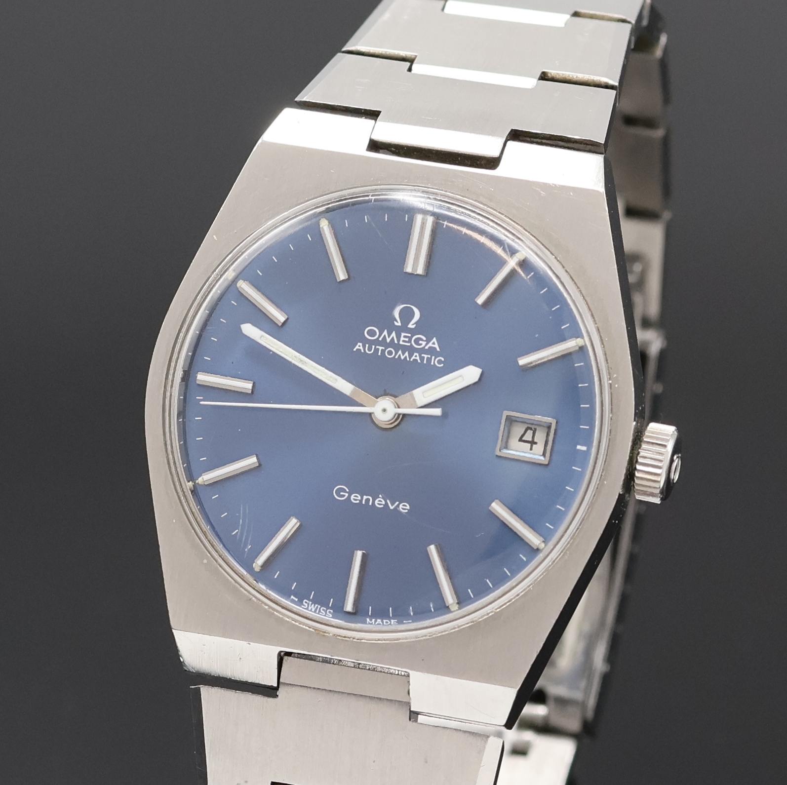 Detail a: OMEGA Geneve Herrenarmbanduhr in Stahl Referenz 166099, Schweiz um 1972, Automatik, verschr. Geh. am integr. Stahlband Ref. 1189/191, orig. Krone, ...