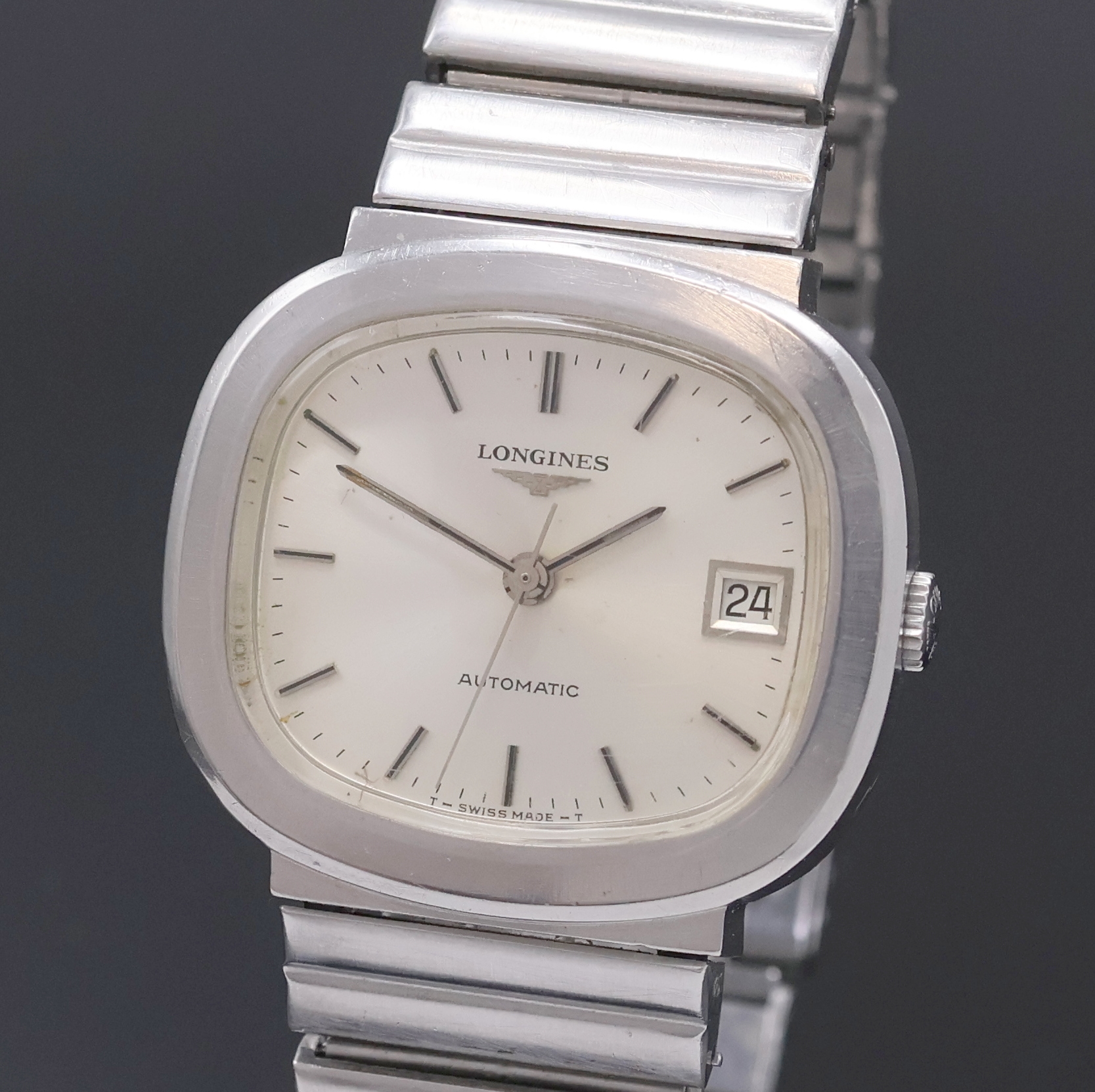 Detail a: LONGINES Herrenarmbanduhr in Stahl/Stahlband, Schweiz um 1972, Automatik, verschr. TV- Screen-Geh., orig. Krone, silb. Zifferbl. fl., silb. Indizes ...